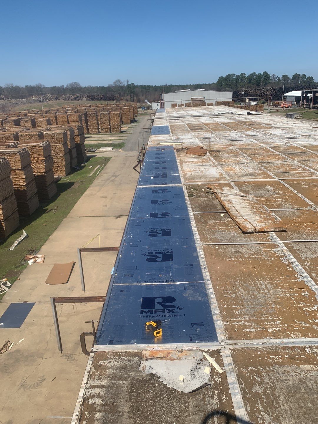 Commercial Roofing Installation using Aluminum Roofing panels by Hostetler Roofing