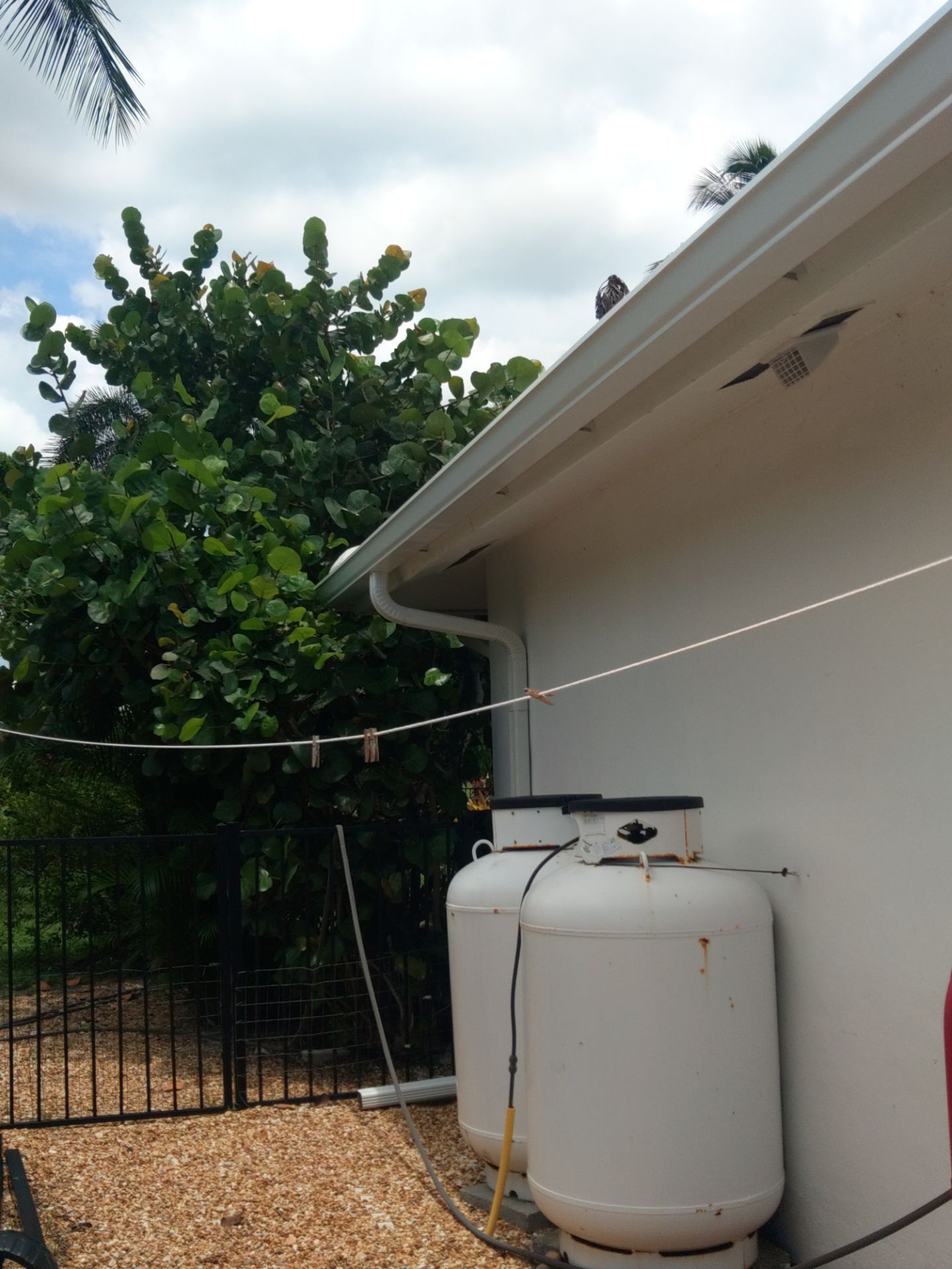 K-Style Seamless Gutter Installation using 3X4 Elbow Downspout in Marco Island, FL  by Gutter Professors