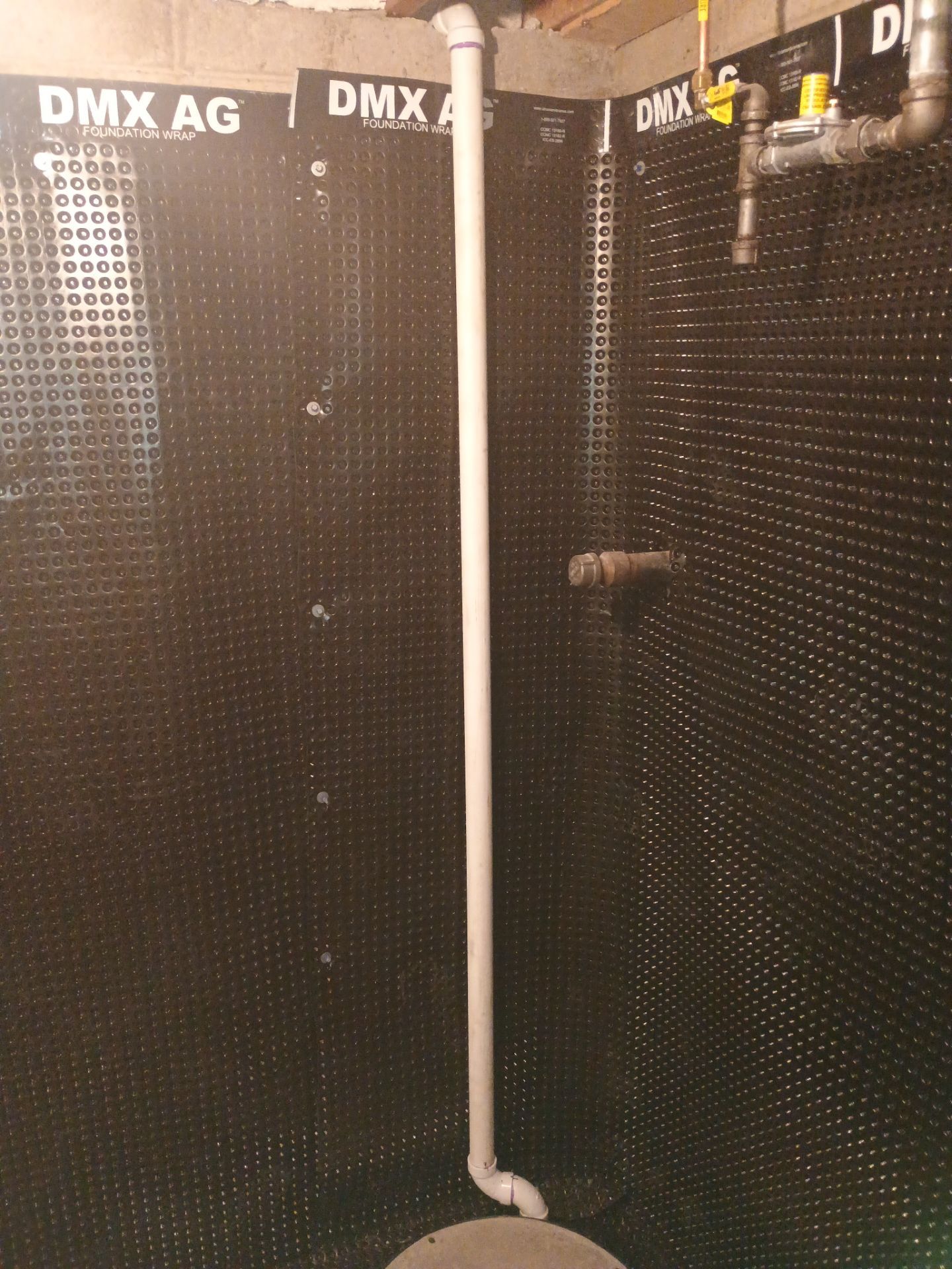Interior Drain Tile & Buried Discharge in South Minneapolis by Waterproofing Northeast