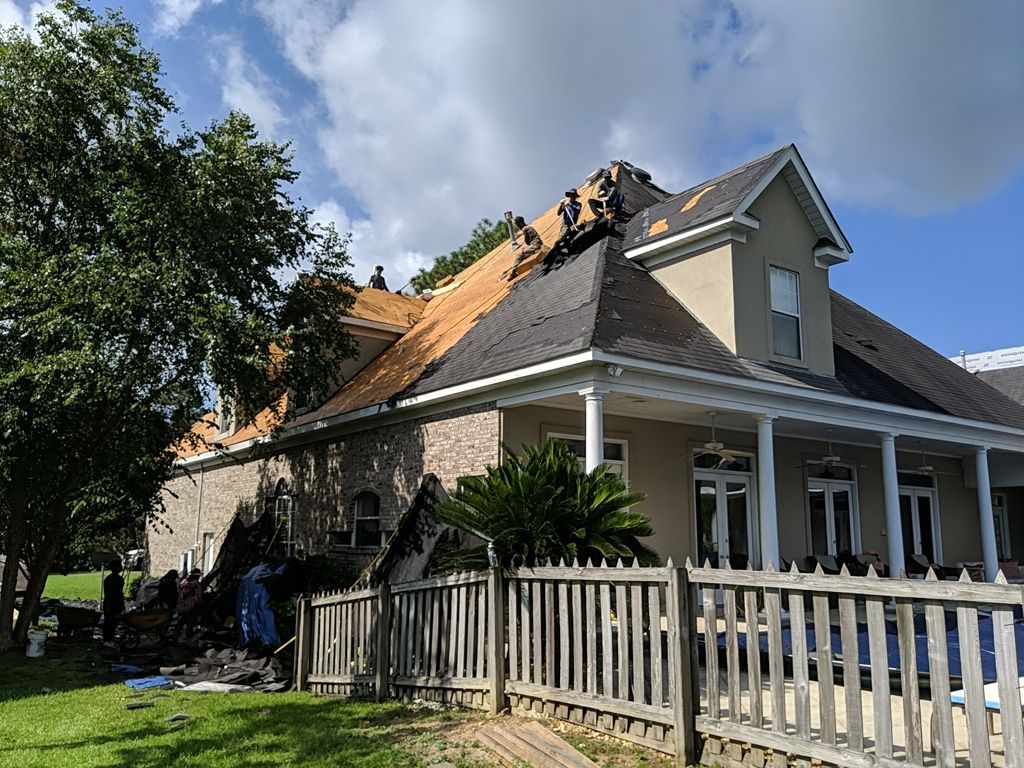 Residential Roofing Repair using Roof Replacement by American Roofing & Construction LLC