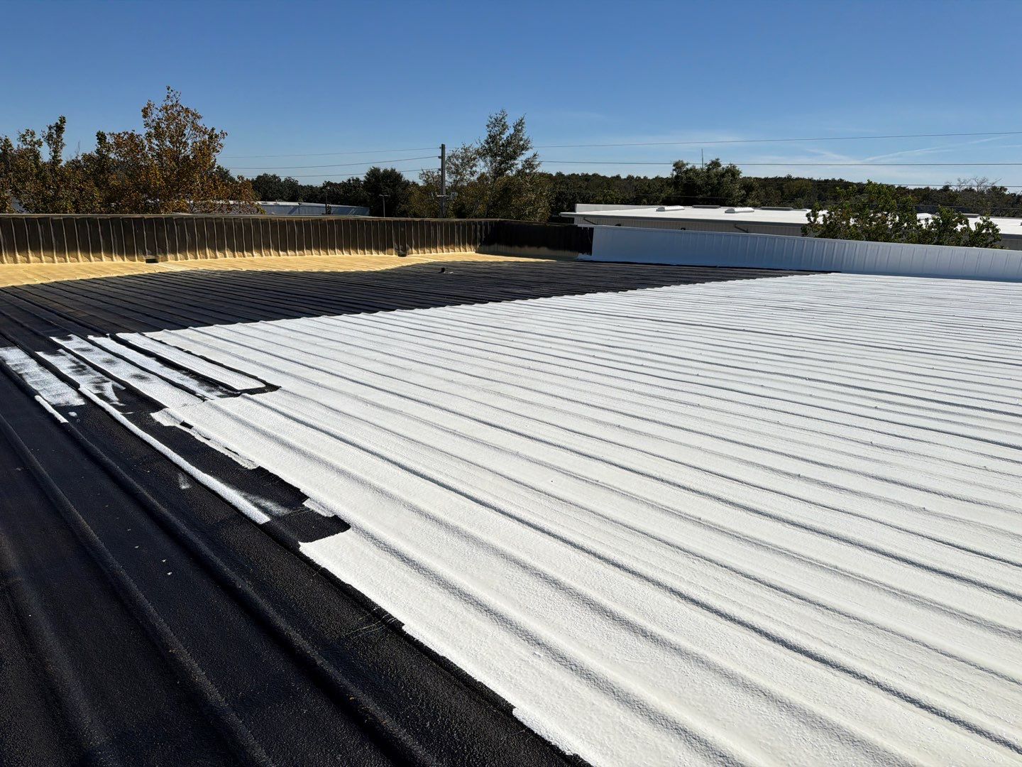 Orlando Commercial Metal Roof Restoration and Silicone Coating System by CES Roofing