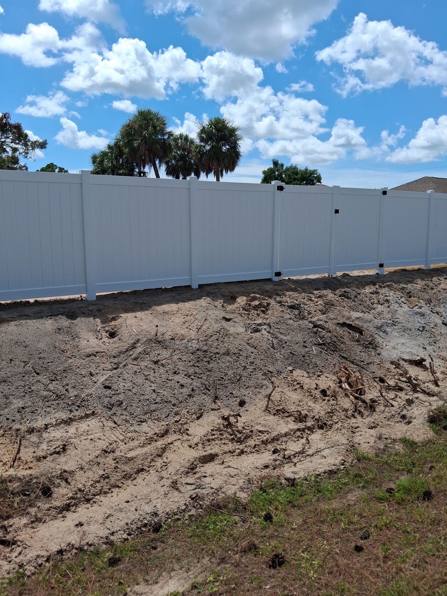 White Vinyl Privacy Fence Installation in North Port Florida by True Fence LLC