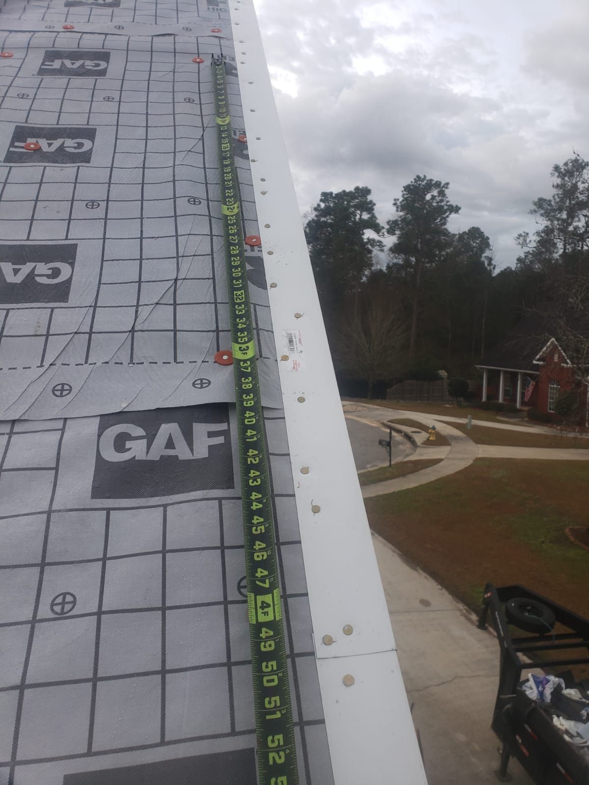 Residential Roofing Installation using Roof Replacement by American Roofing & Construction LLC