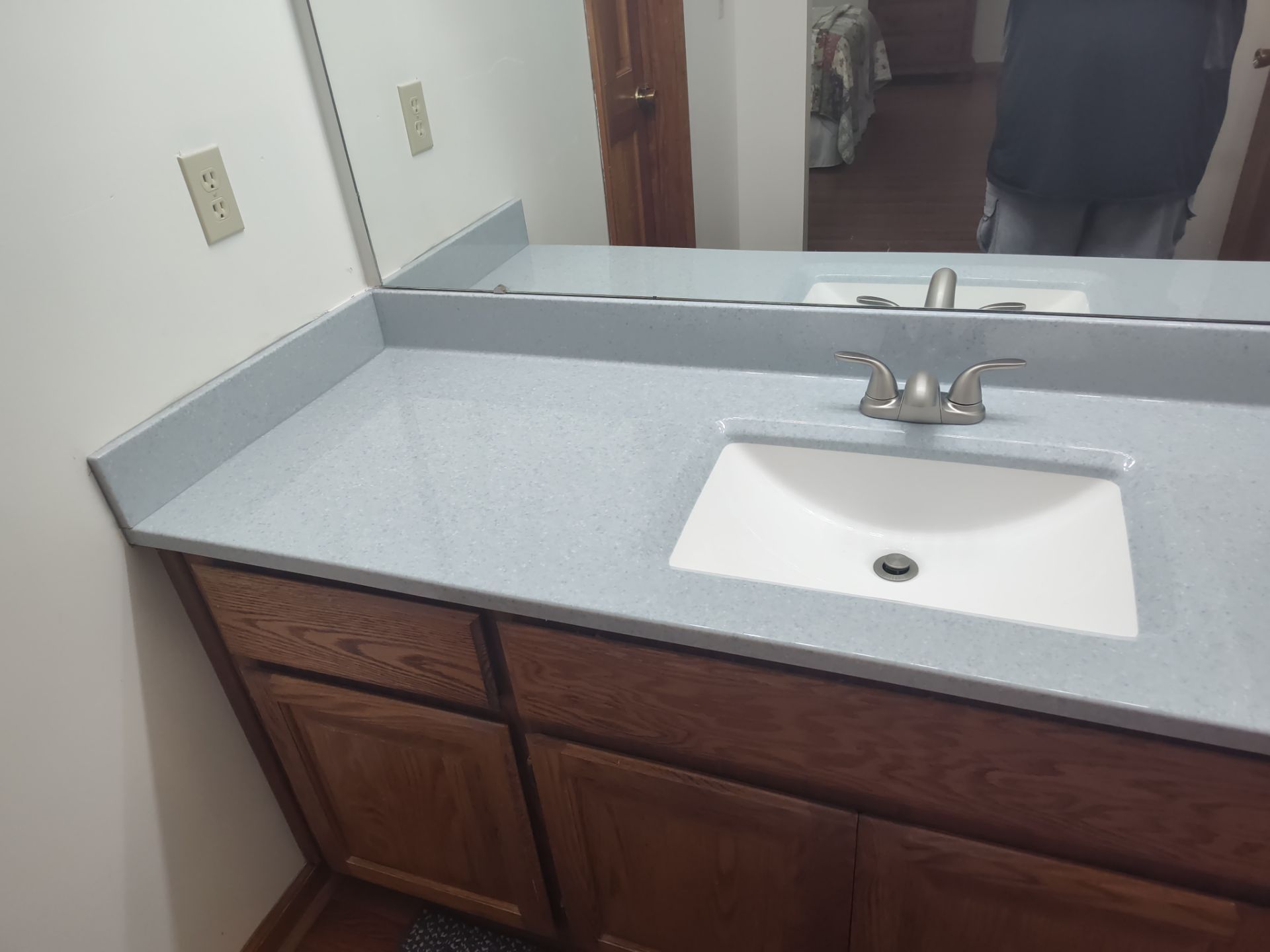 Bathroom Remodel using Onyx base and shower walls with seat & caddie by Cornerstone Home Builders, LLC