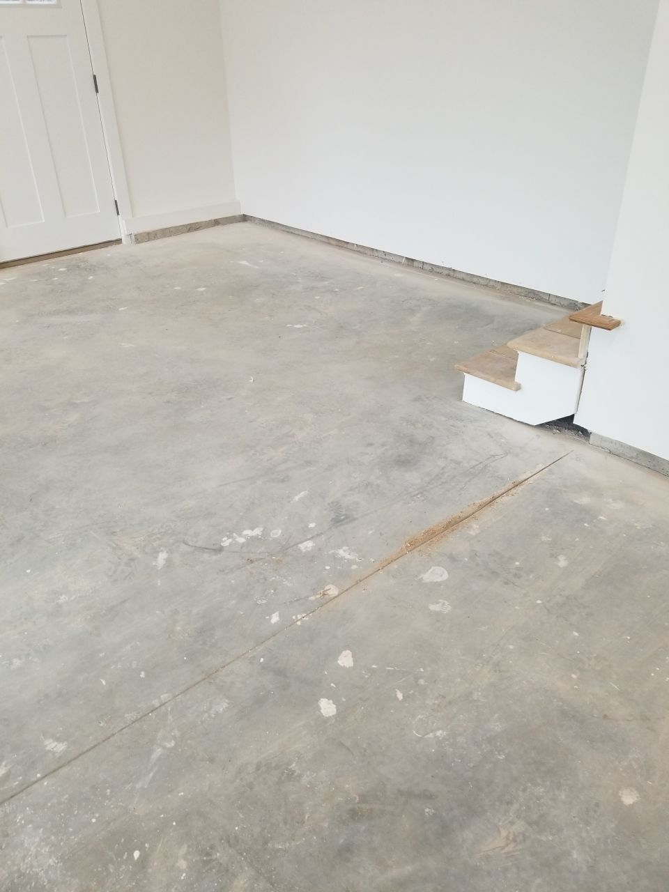 Garage Floor in Sandstone by Spectrum Painting, LLC
