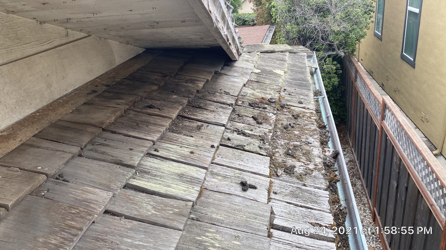 Refurbish and repair shake roof to get ready to sell by Straight Edge Roofing Inc