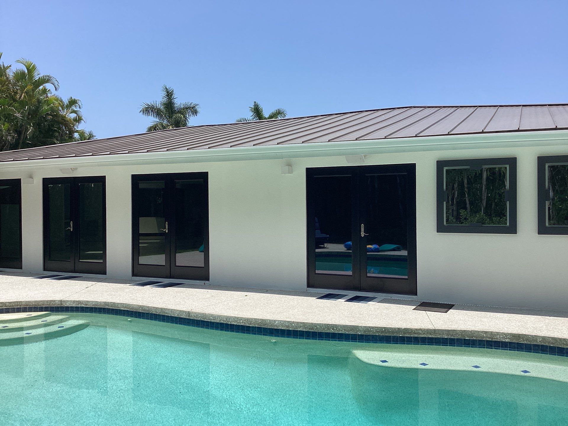 White Seamless Gutters and Downspouts in Sarasota FL by Gutter Professors
