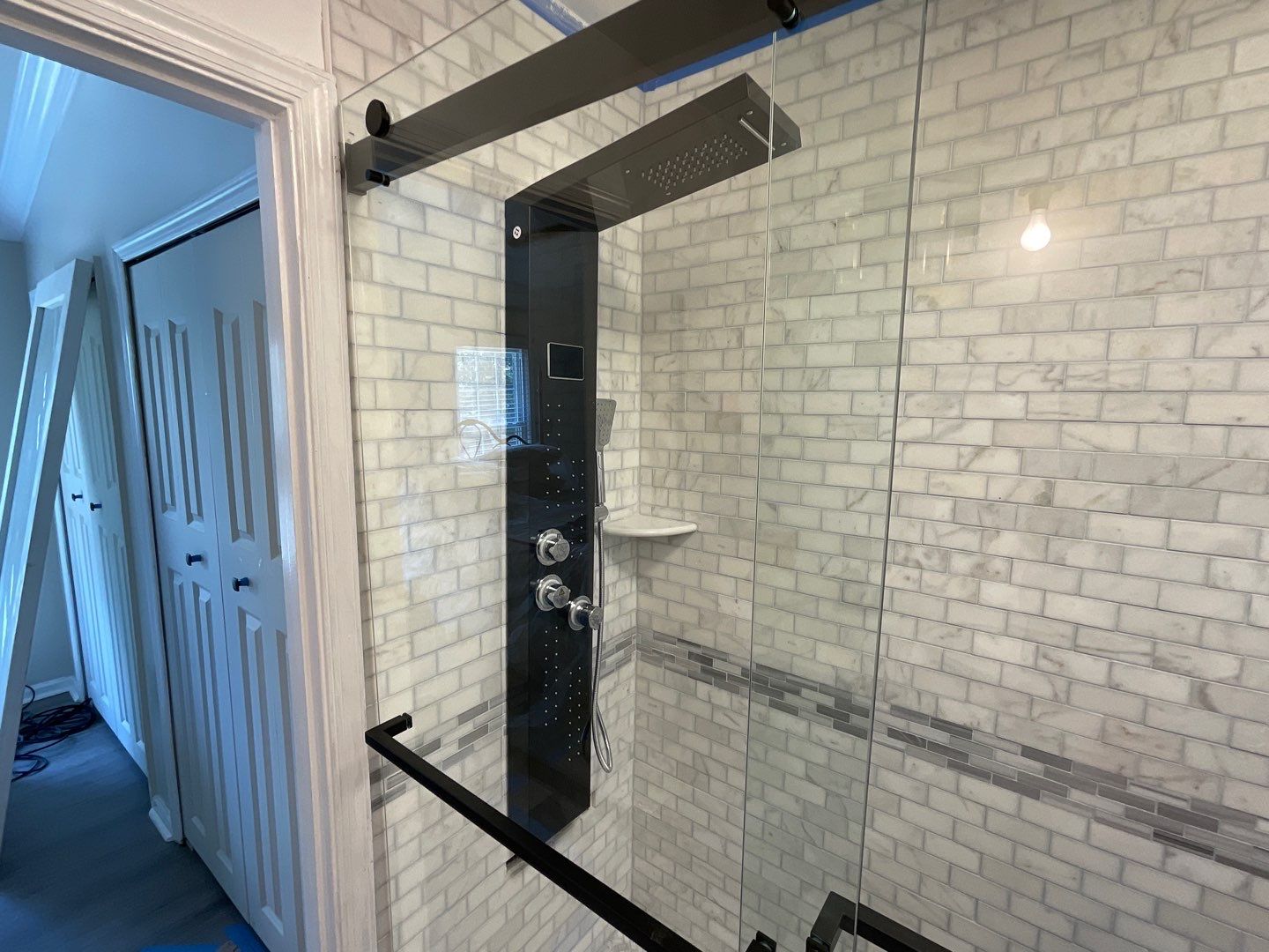 Bathroom Remodel using Two new bathroom design and new floors by Alpha Design Services