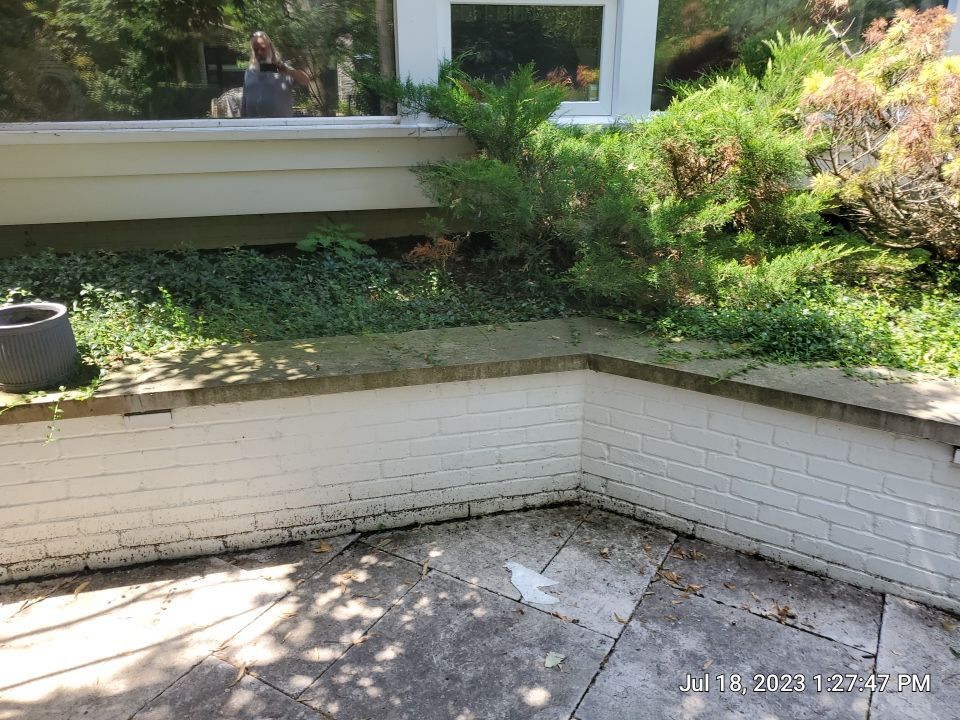 marble patio cleaning and sanding using Polysweep polymeric sand by Northern Power Washing LLC.