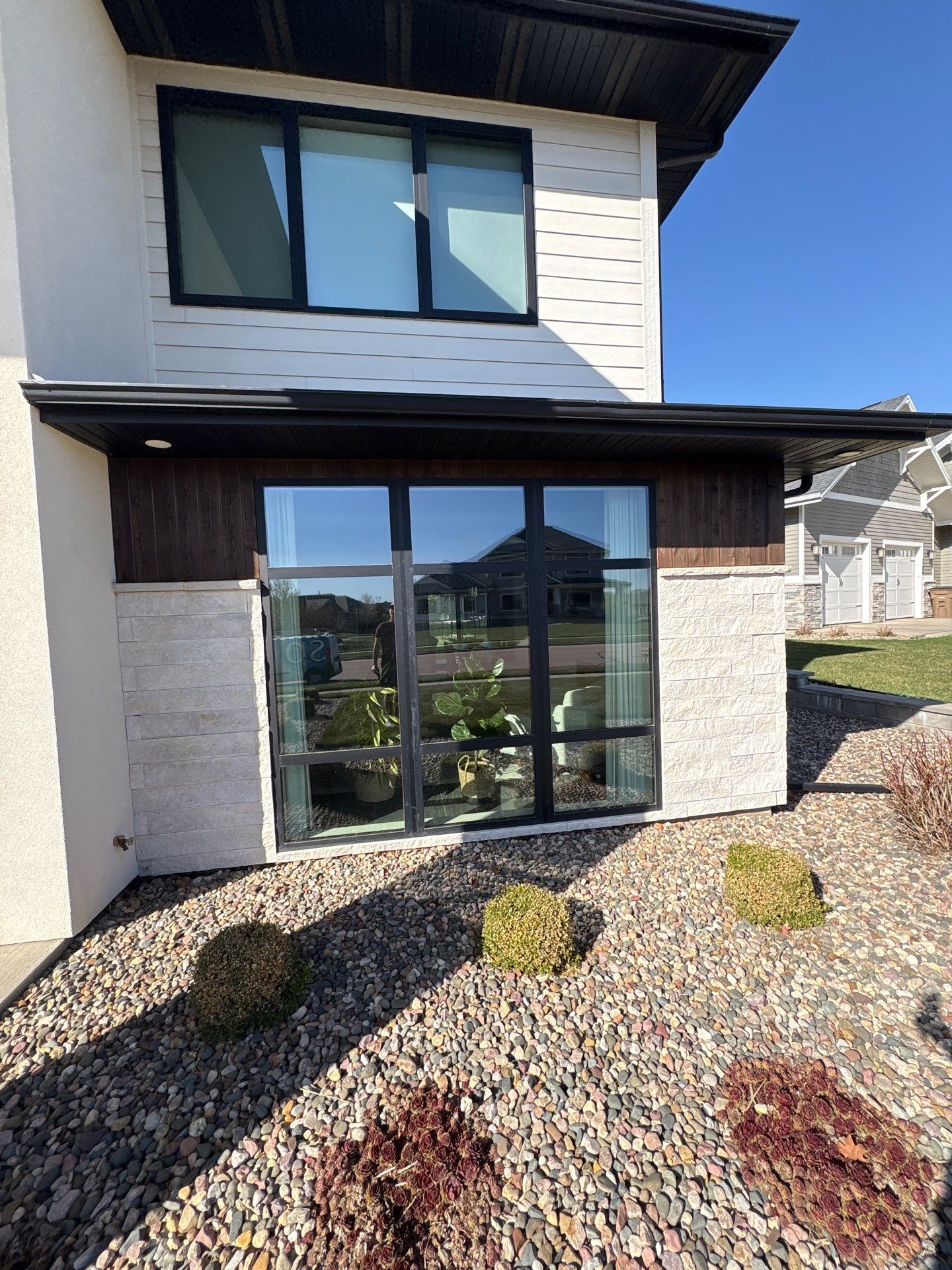 Modern Residential Exterior Painting and Door Refinishing in Sioux Falls by Select Painting, Coatings & Garage Cabinets