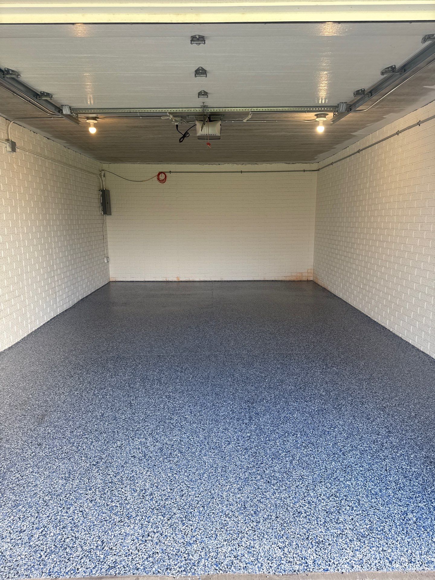 Grimes Garage Floor Coating by Revival Concrete Coatings