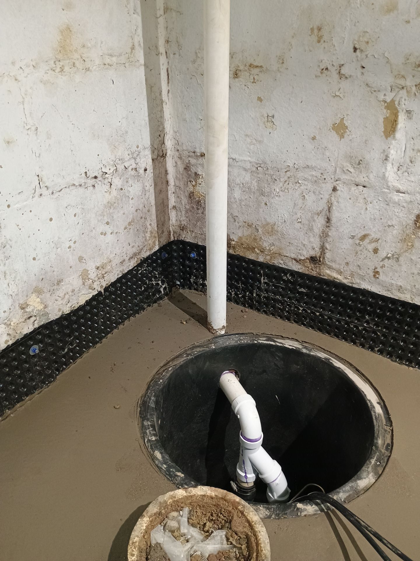 Basement Waterproofing (Drain tile & Sump pump) in North Minneapolis by Waterproofing Northeast