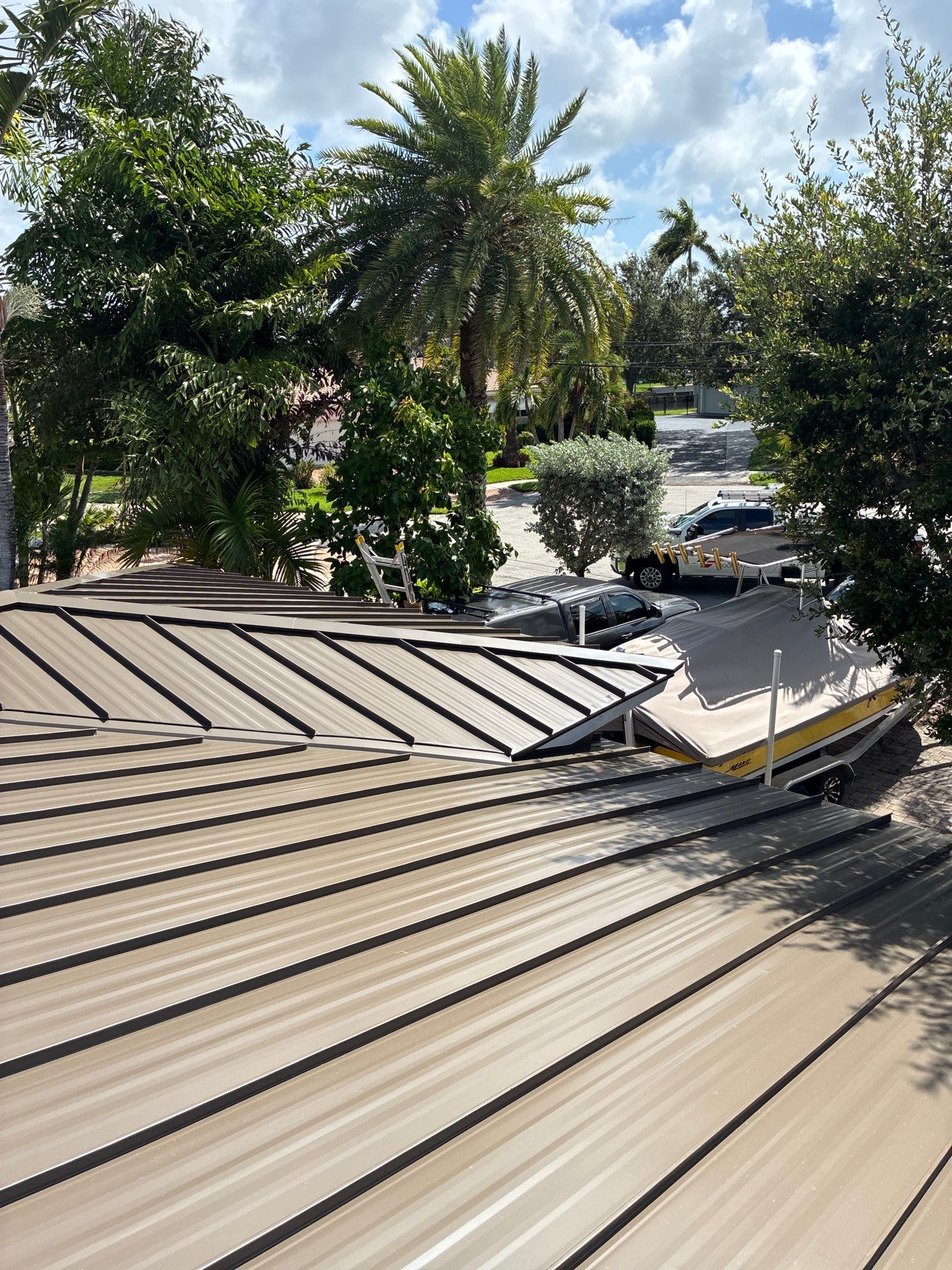 .032 Aluminum 1.5" Mechanical Seam Medium Bronze by Total Roofing System The Metal Roof Experts