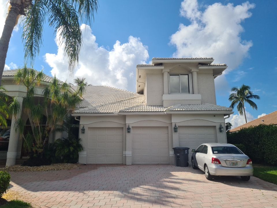 Residential Roofing Installation using 1" Nail strip metal roof by BLUES BROTHERS CONSTRUCTION CORP
