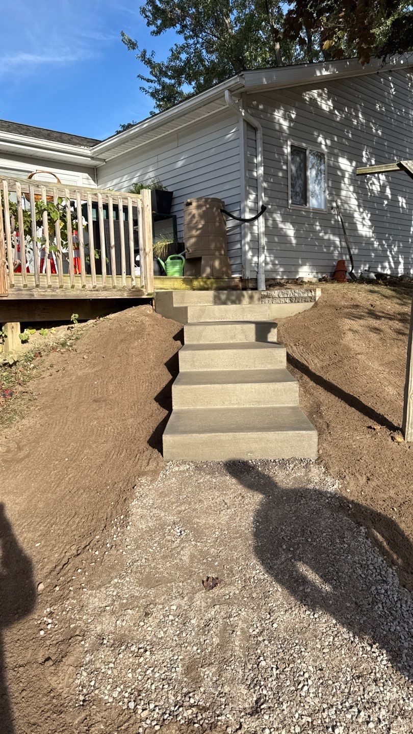 Broom finished concrete pad and steps  by NG Masonry & Construction LLC