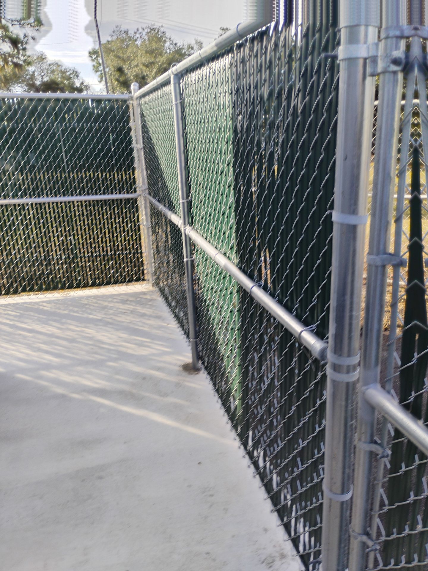 Commercial Chain Link Fence with Slats in Port Charlotte by True Fence LLC
