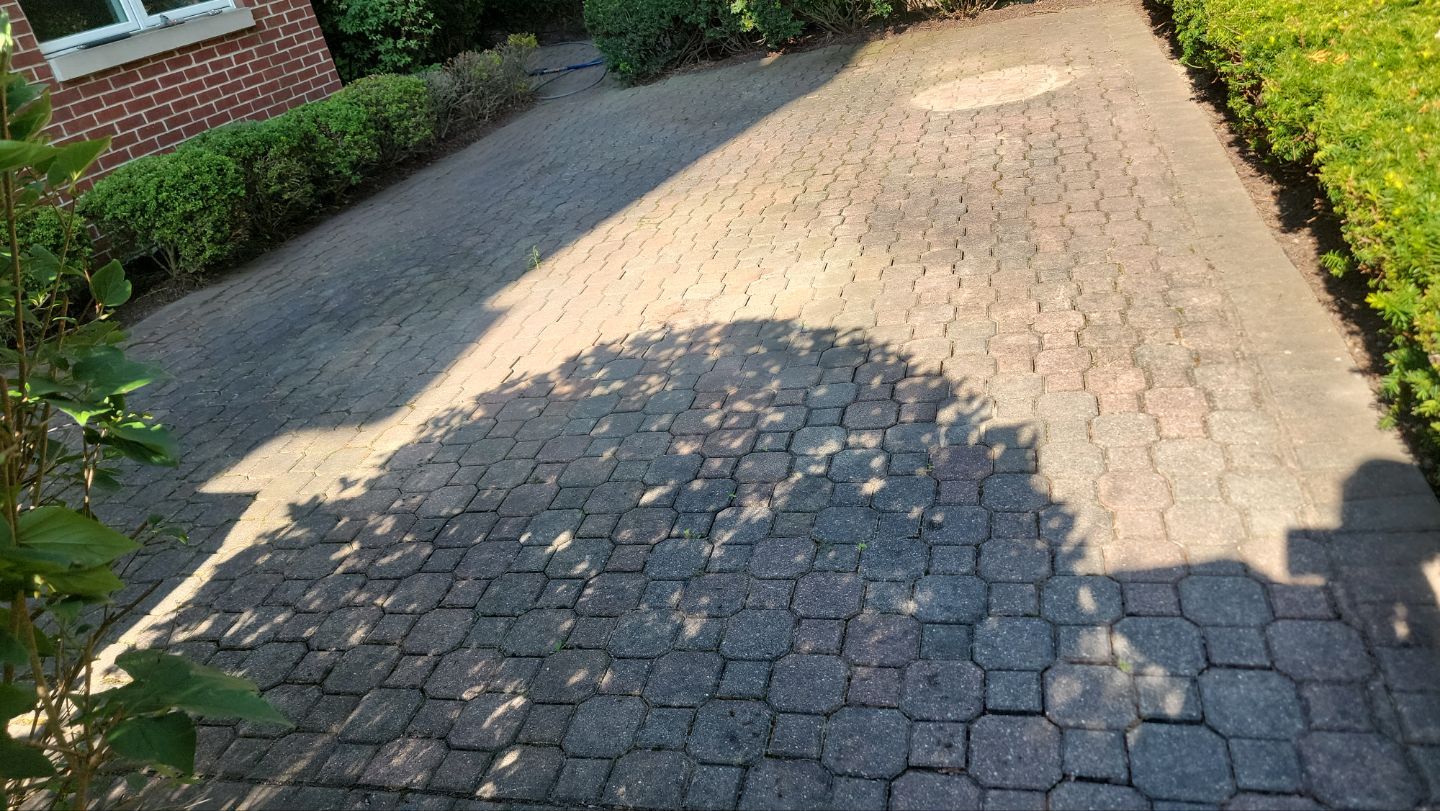 Brick paver repair, clean and seal by Northern Power Washing LLC.