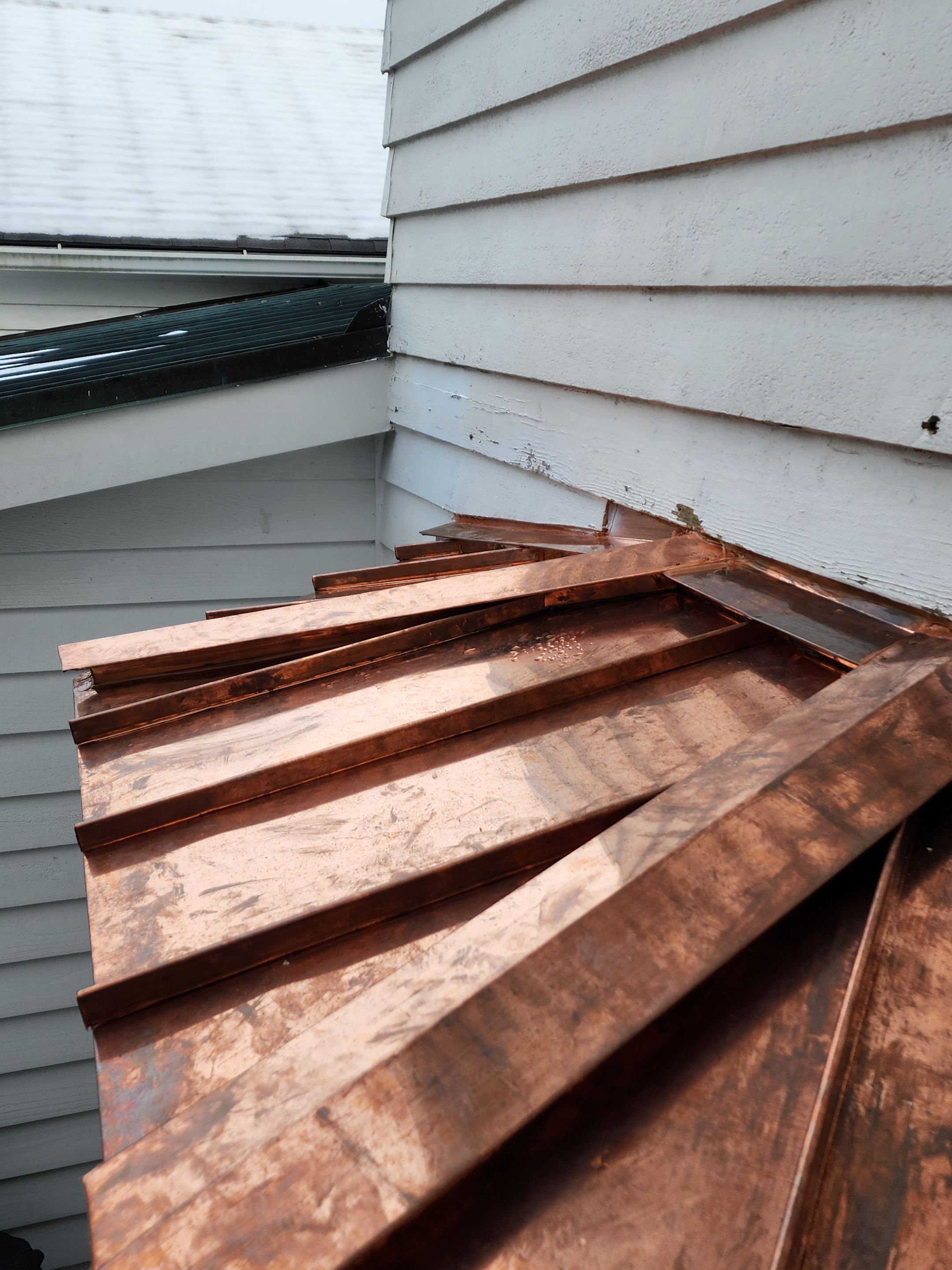 Copper Roof using Copper by Absolute Roofing and Construction