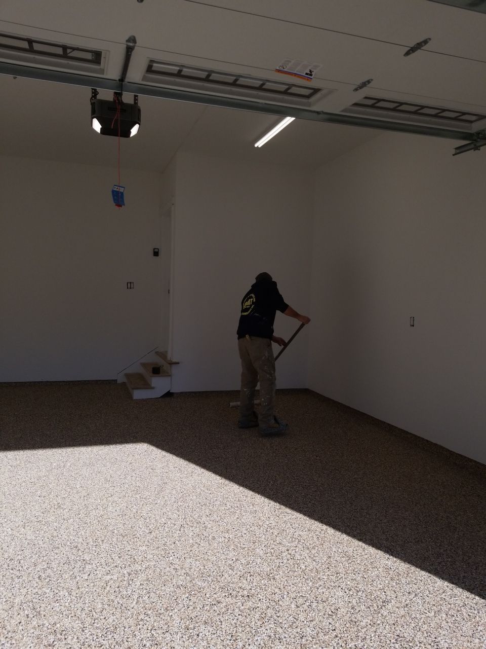 Garage Floor in Sandstone by Spectrum Painting, LLC