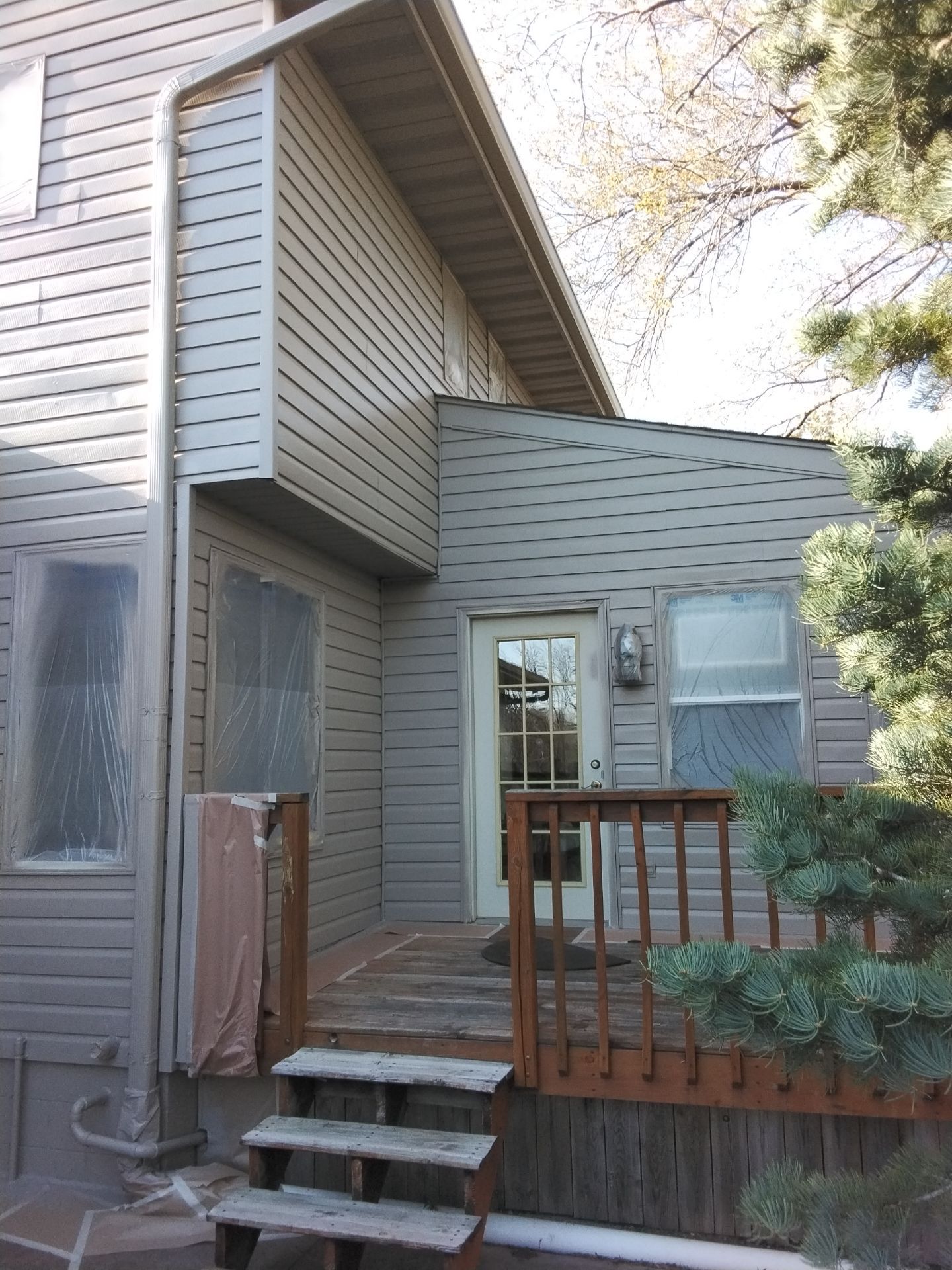 Residential Exterior Repaint Including Shop and Shed  by Midwest Paint LLC