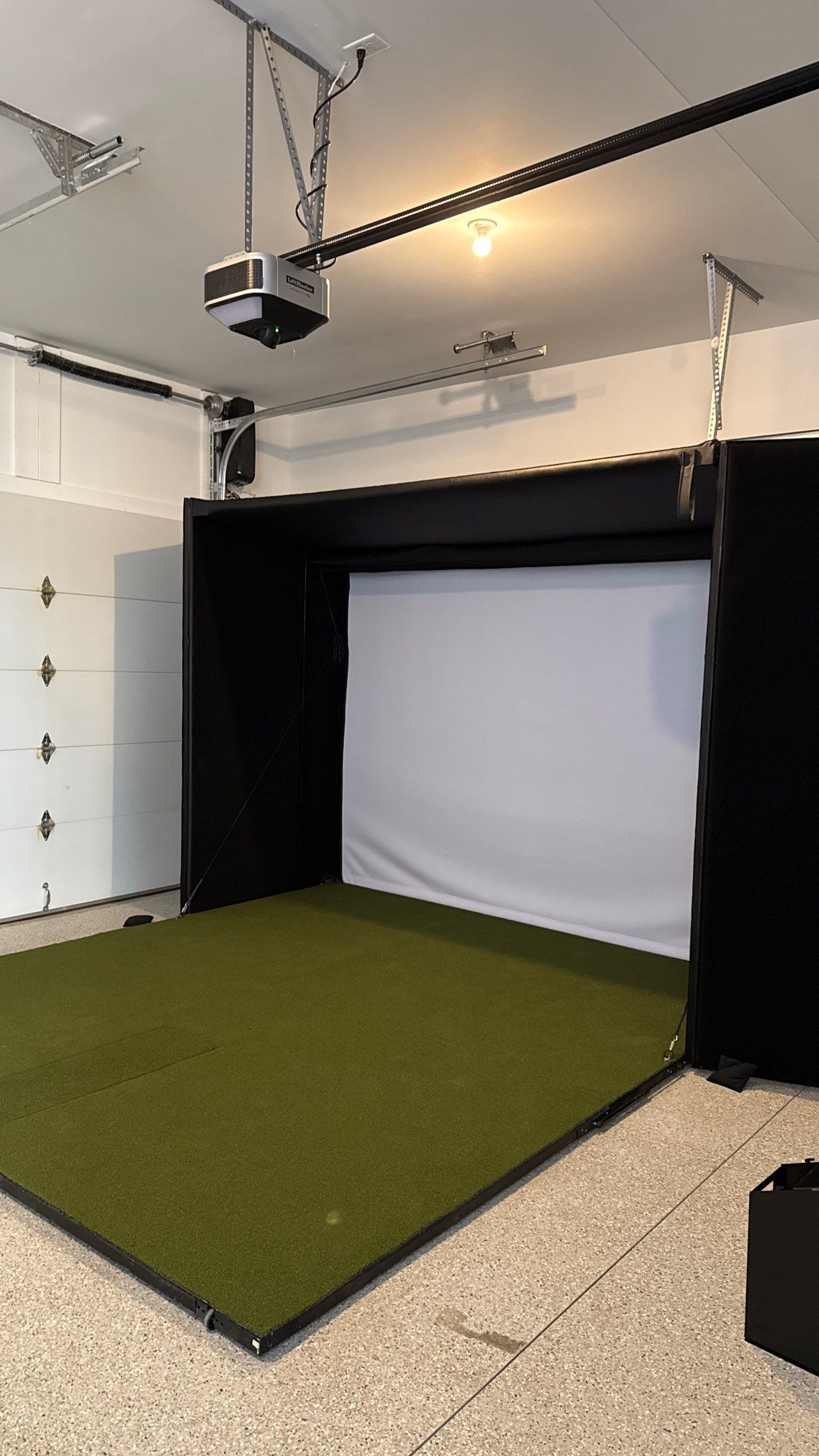 Ben Took It To The Next Level With a Golf Simulator by Banner Garage