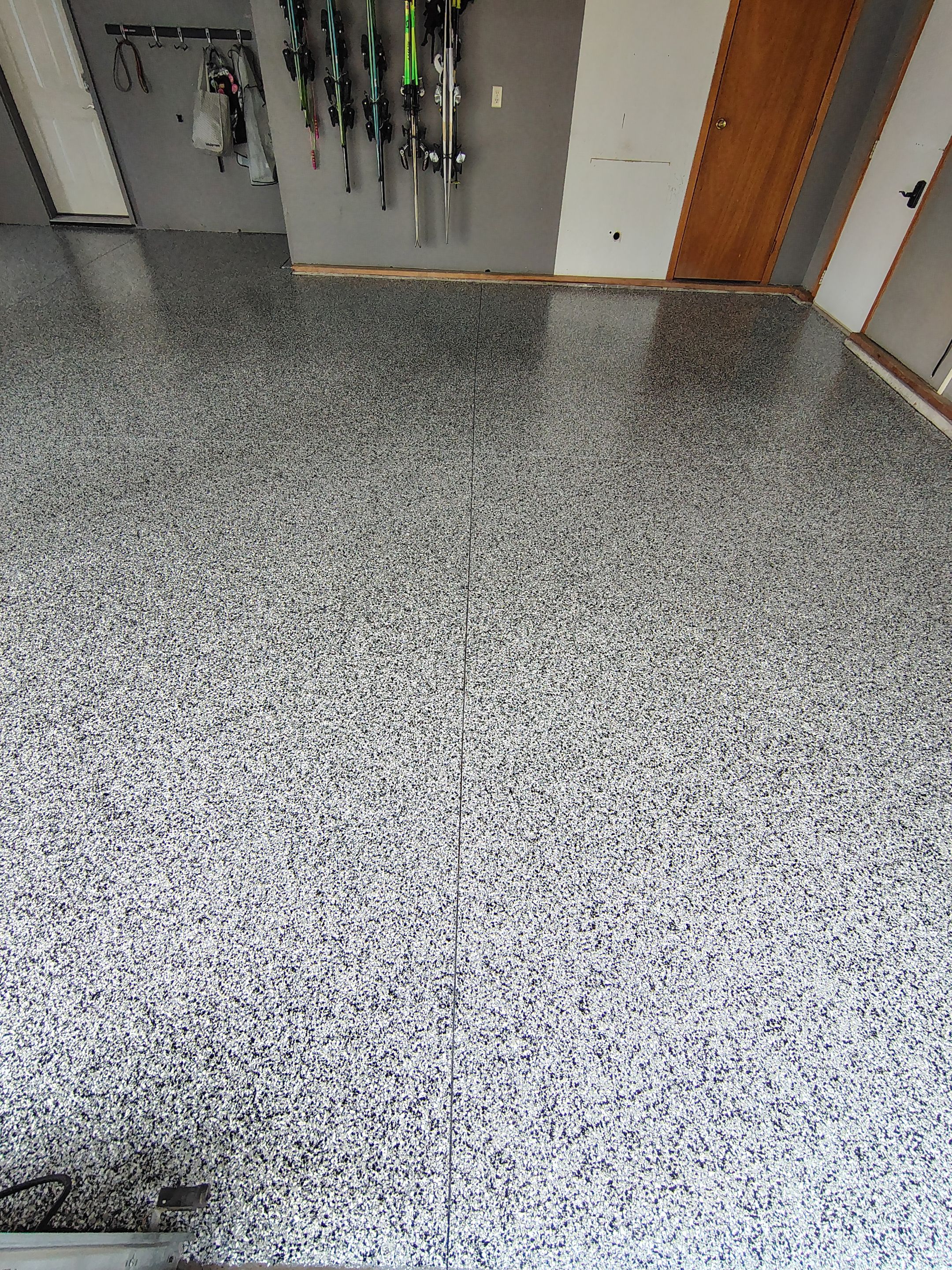 Garage Floor Concrete Coating and Crack Repair in Sioux Falls by Select Painting, Coatings & Garage Cabinets