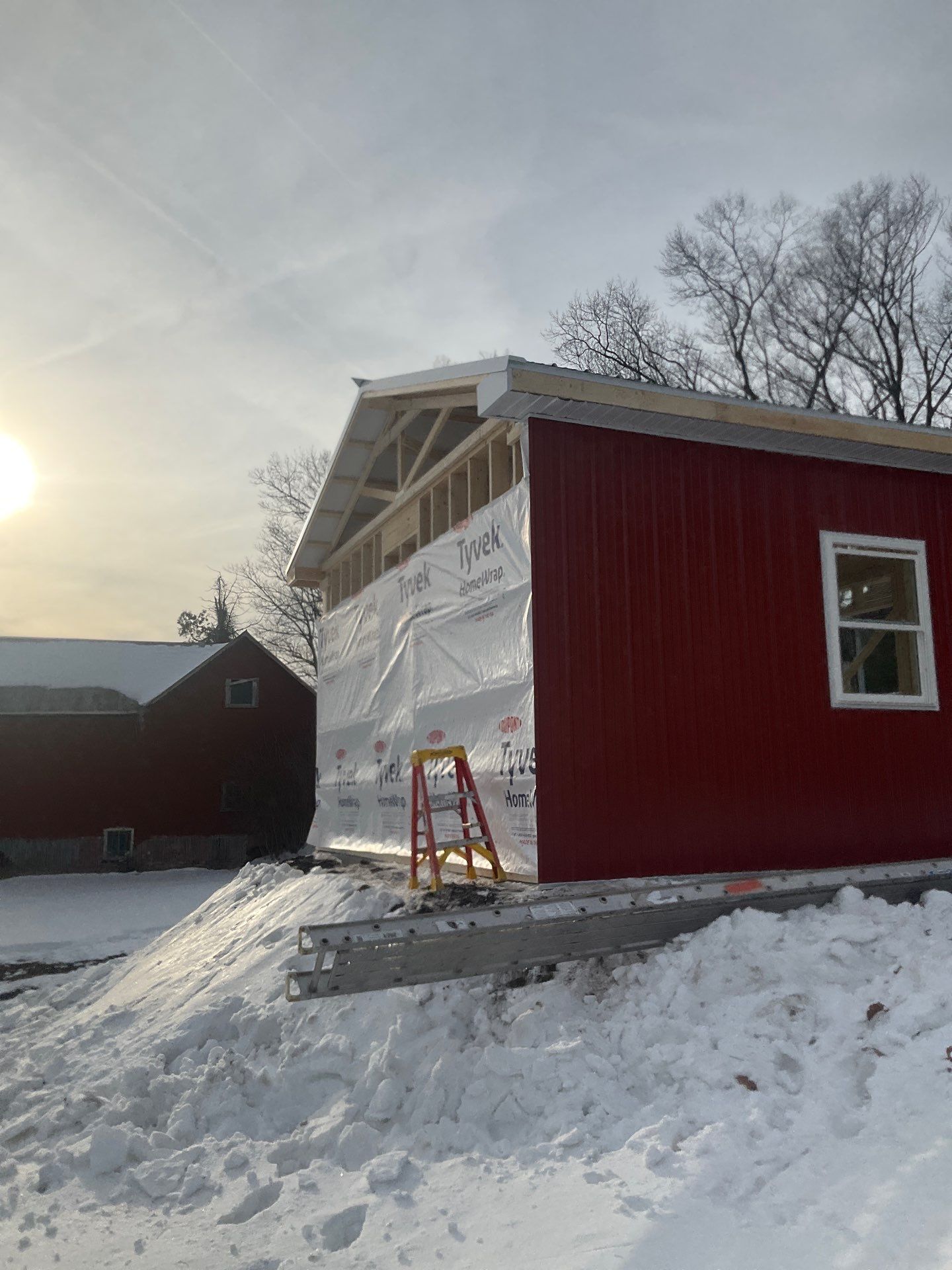 New Red Metal Garage Construction and Residential Window Replacement in Ashland by Esh Builders