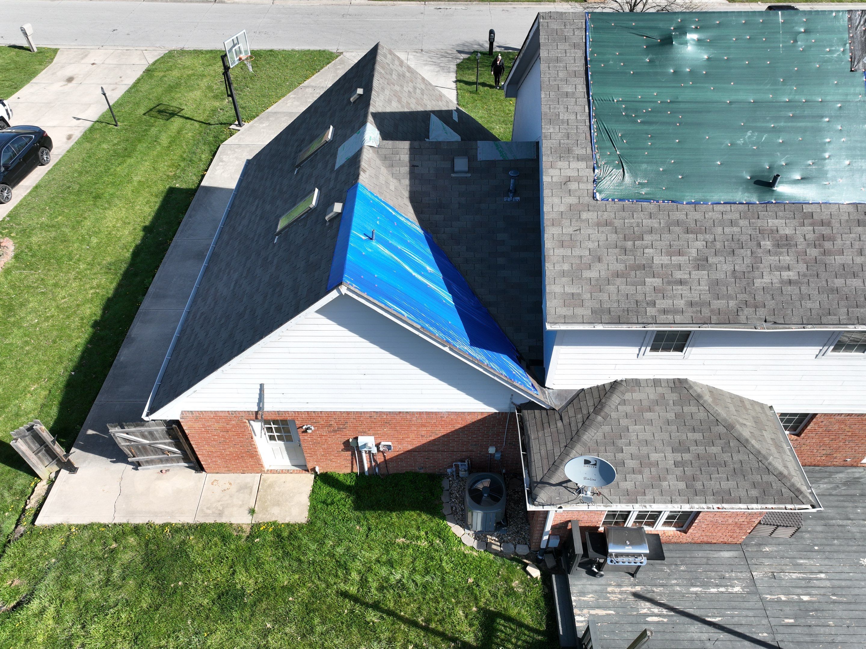 Tornado damage in Whiteland. Roof replacement, James Hardie siding, exterior paint, gutters, windows, doors by 317 Roofing & Restorations