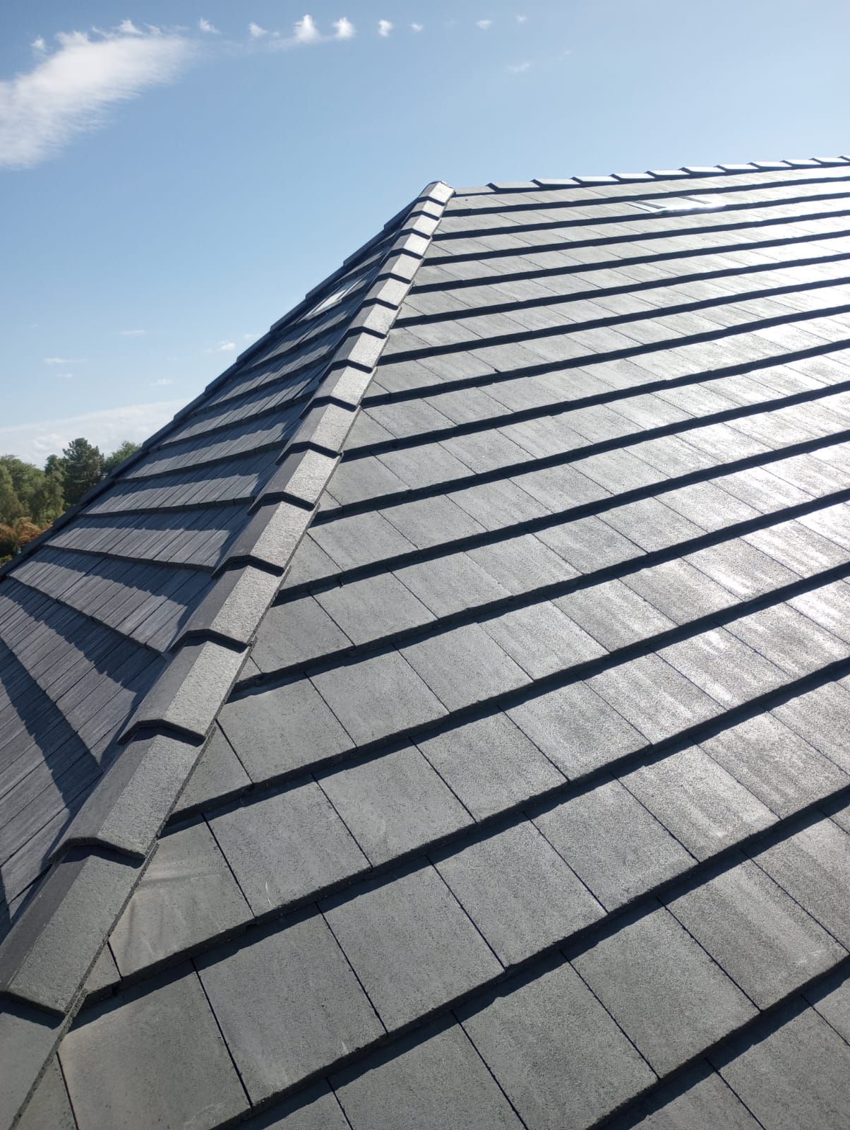 Gray Tile by Reimagine Roofing