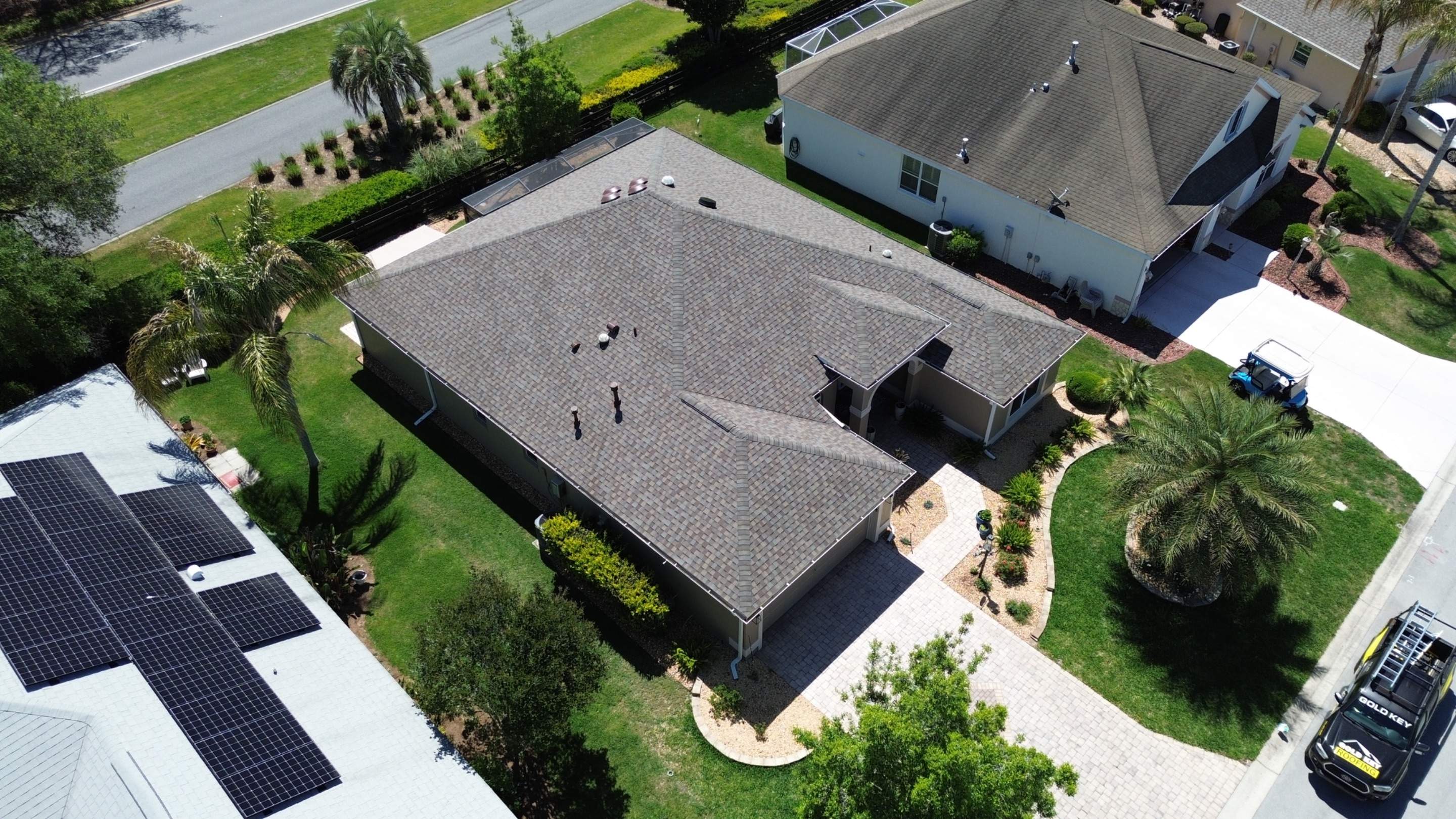 Before and after drone pictures in The Villages FL by Gold Key Roofing