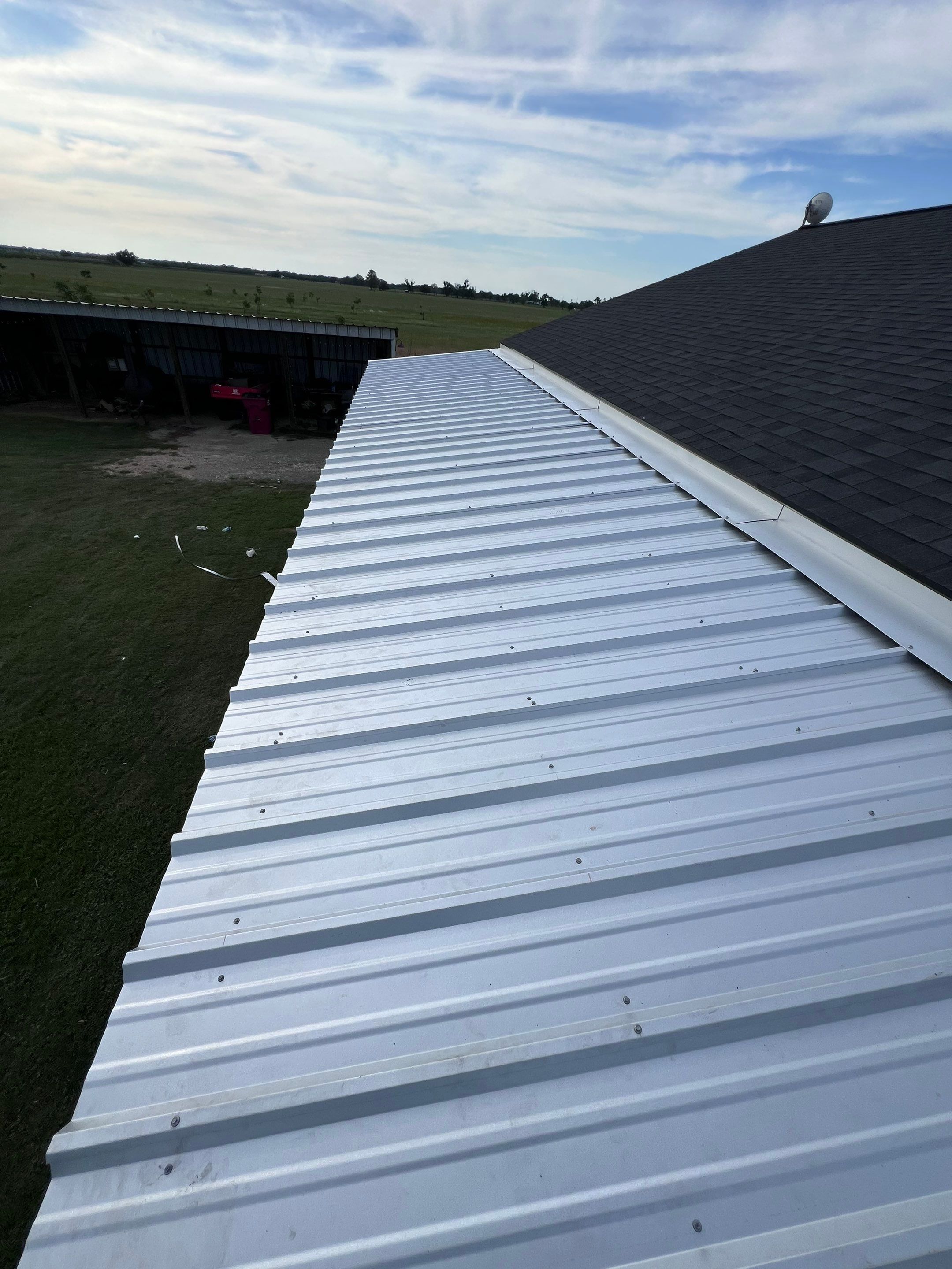 Residential Roofing Installation using Metal by Roof Repair Company