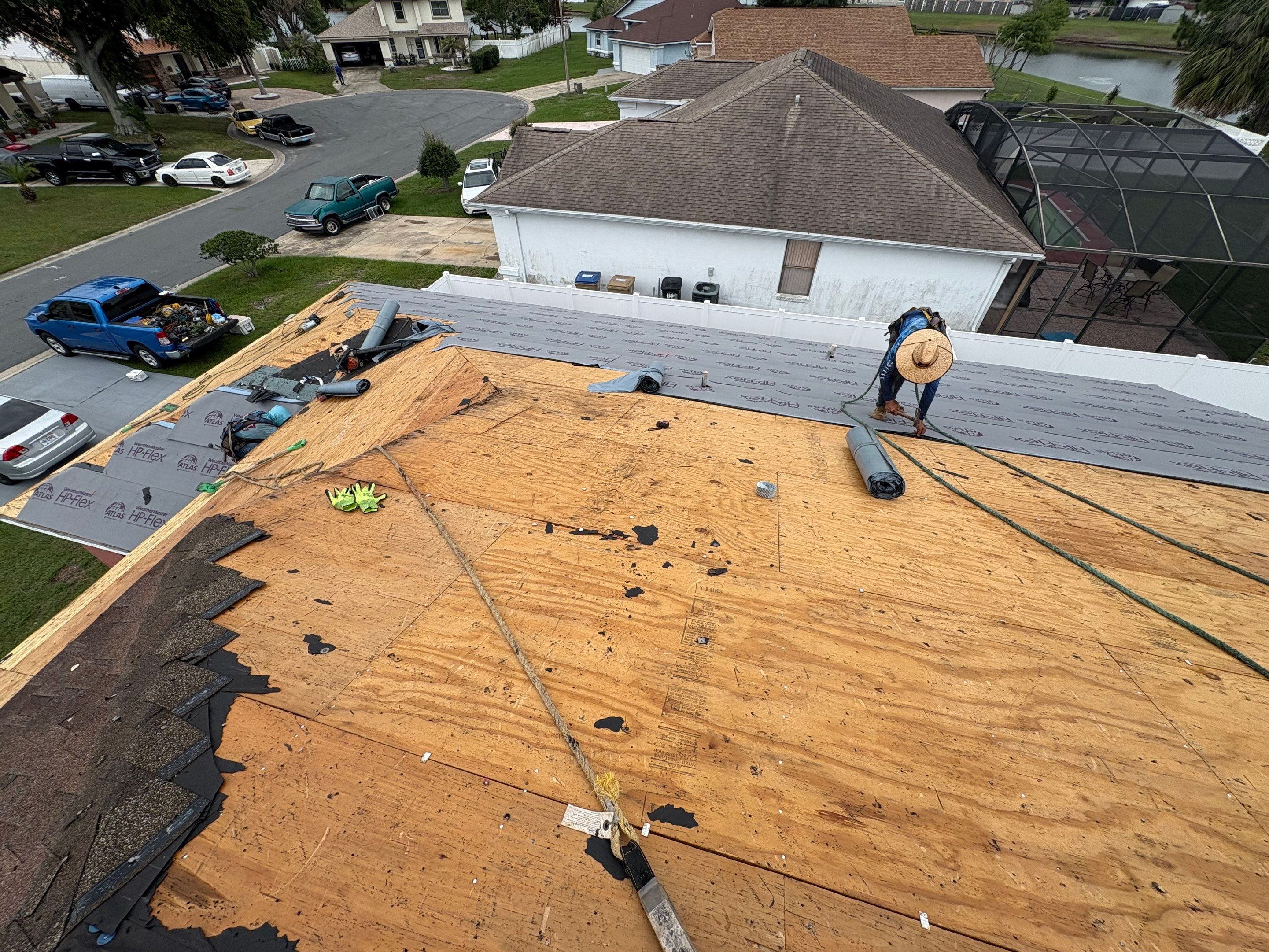 Residential Metal Roofing Installation and Gutter Replacement in Kissimmee by Pinnacle Roofing Group
