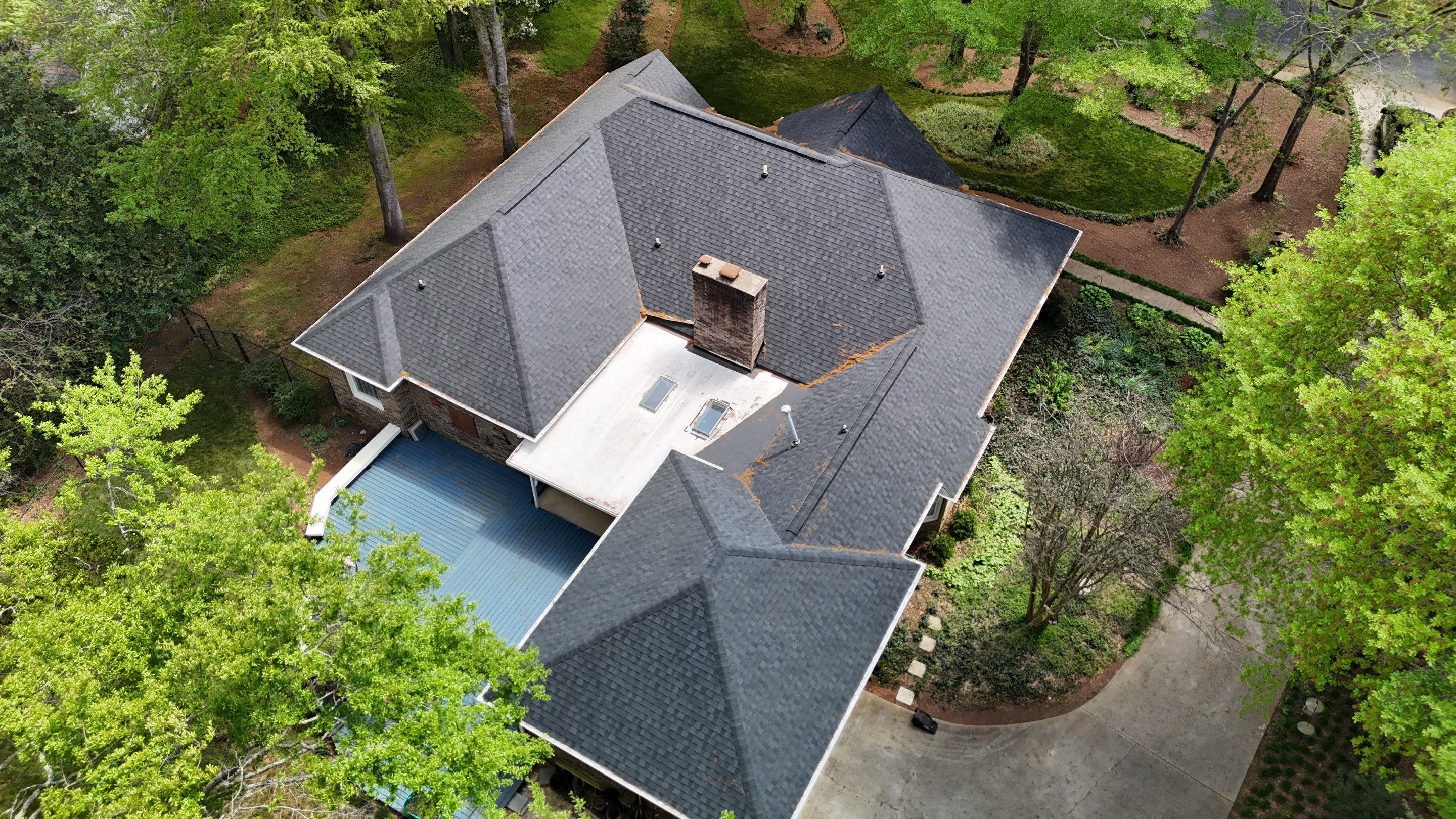 Spartanburg Residential Roof Replacement with Architectural Shingles and Skylights by Roofers LLC
