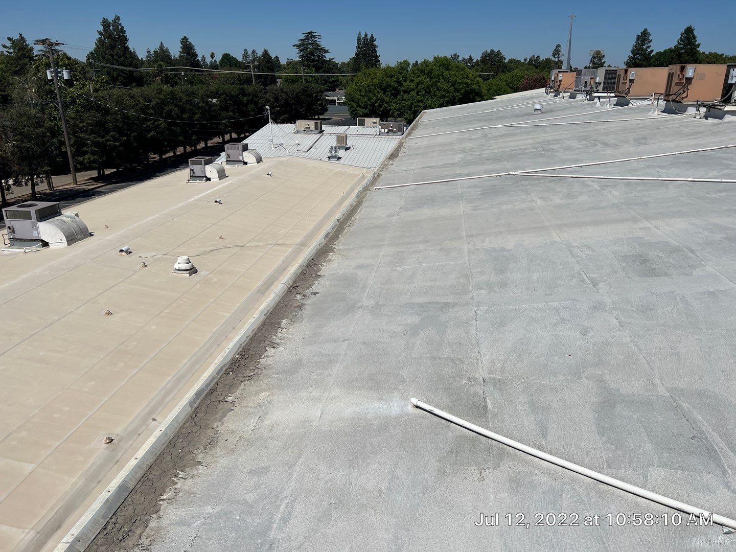 MR Roofing system using Benchmark/PUMA XL coatings over TPO single-ply roofing by Straight Edge Roofing Inc
