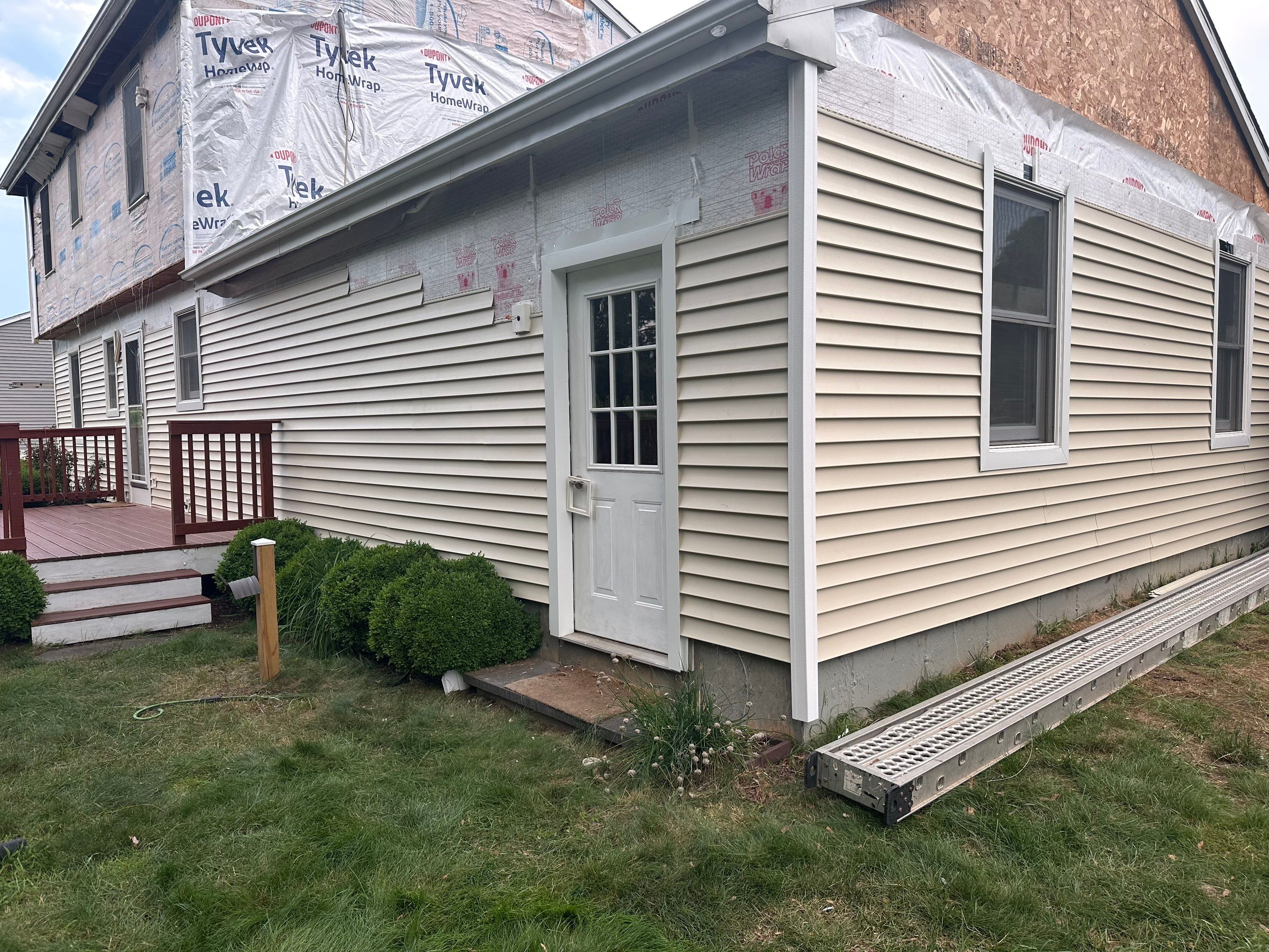 Siding Installation using CertainTeed Monogram Vinyl Siding - D4 - Desert Tan by A Plus Exterior