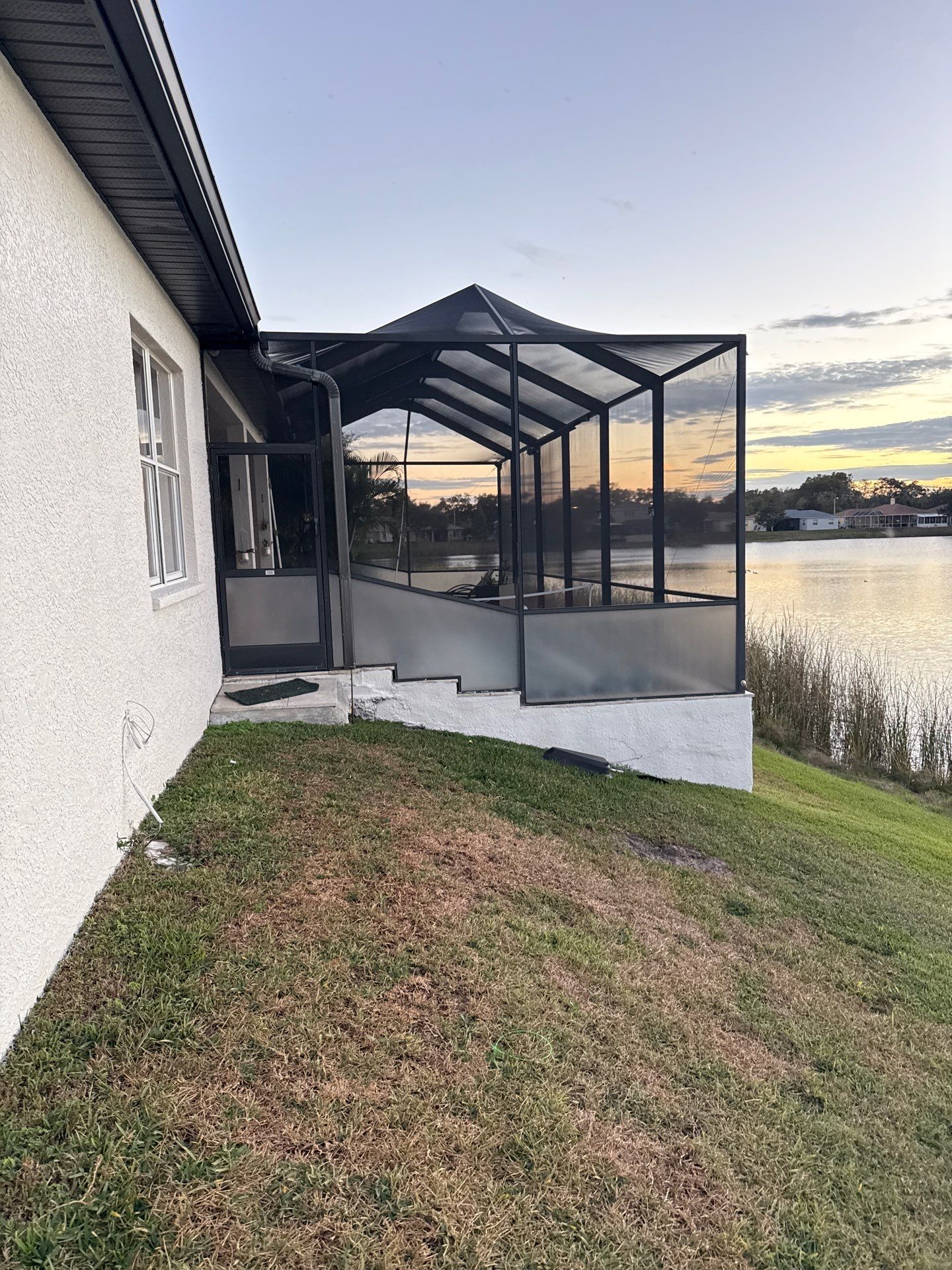 Black Aluminum Gutters with Matching Downspouts in Tampa FL by Gutter Professors