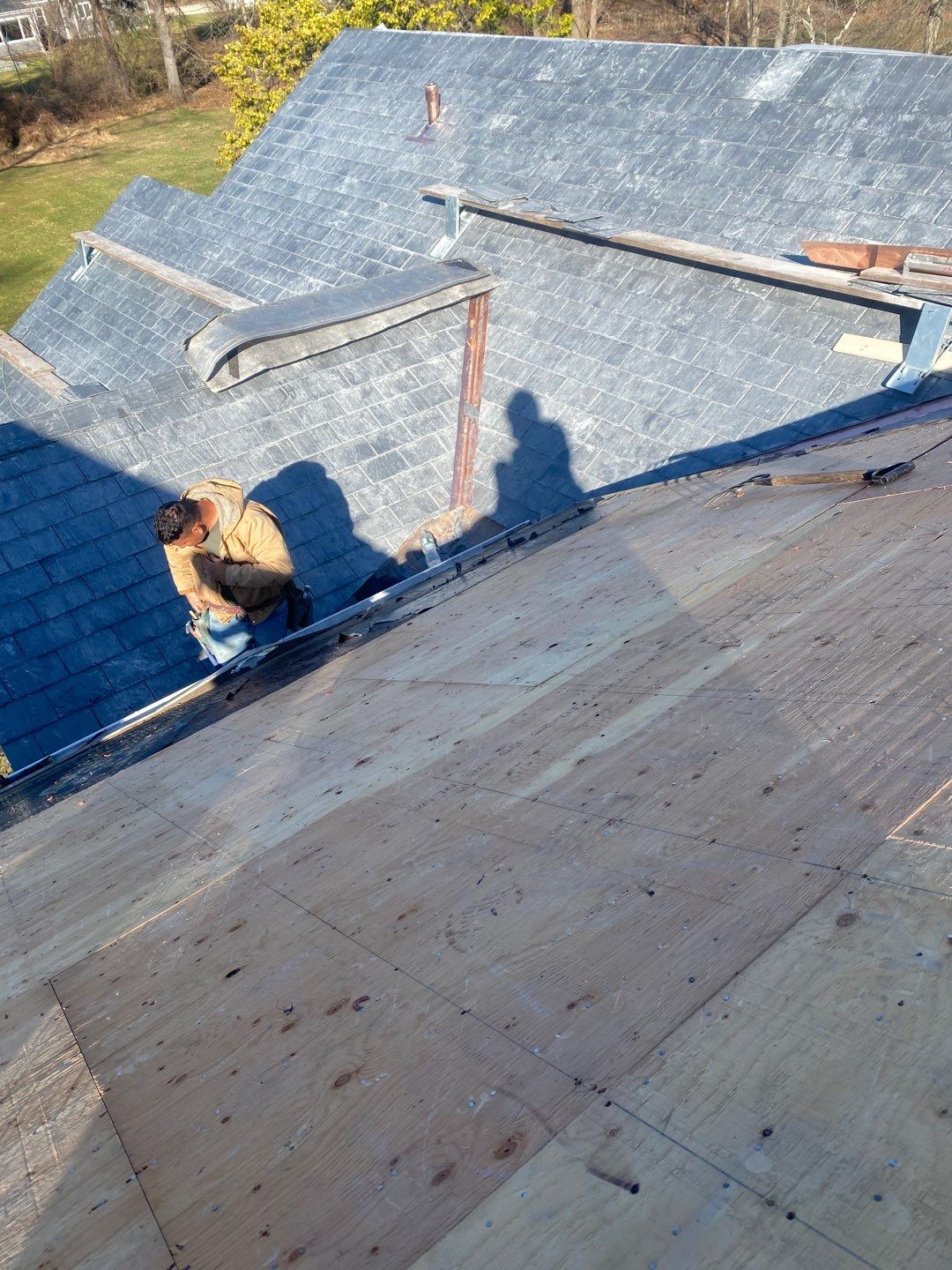Residential Roofing Installation using Vermont Slate by A Plus Exterior