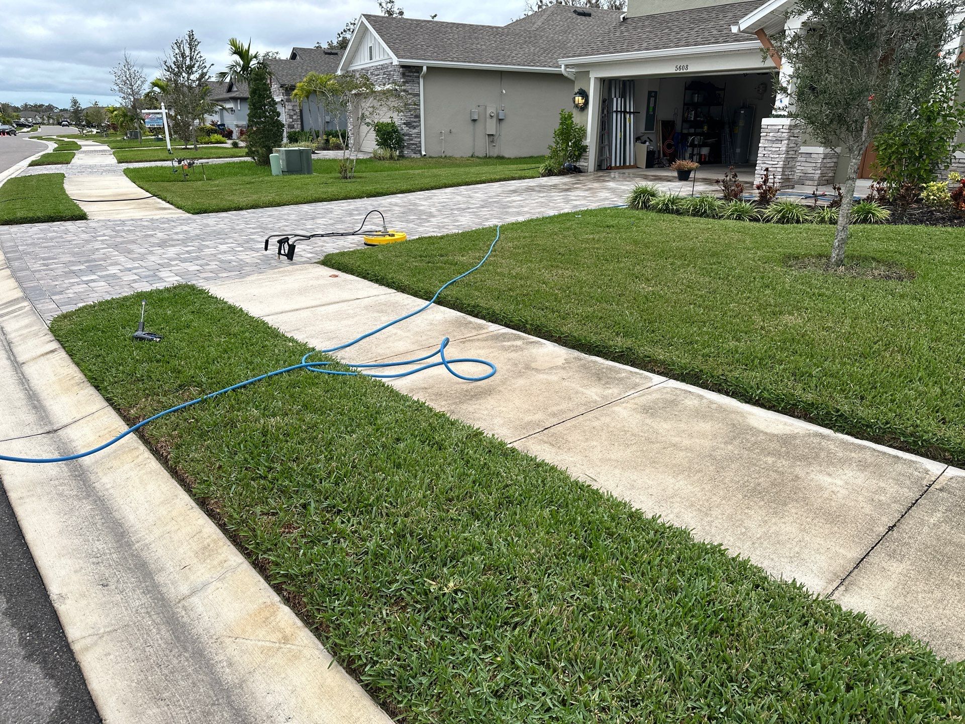 House Wash, Paver Driveway & Sidewalk Cleaning + Sanding & Sealing in Trevesta Community, Palmetto, FL by Sunshine AquaWash