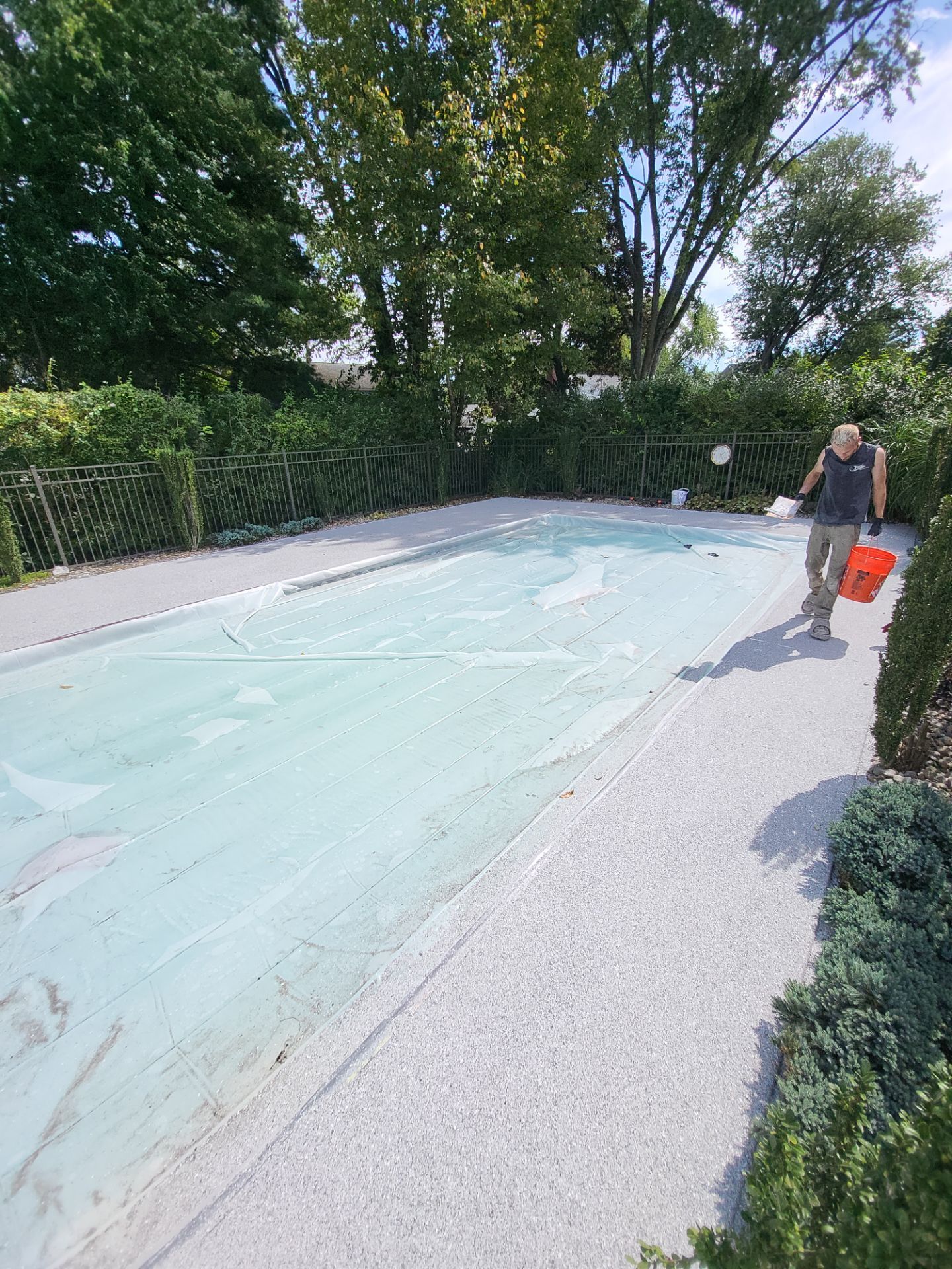 Blue Granite Pool Patio Concrete Coating in Lincoln Park by Spectrum Painting, LLC