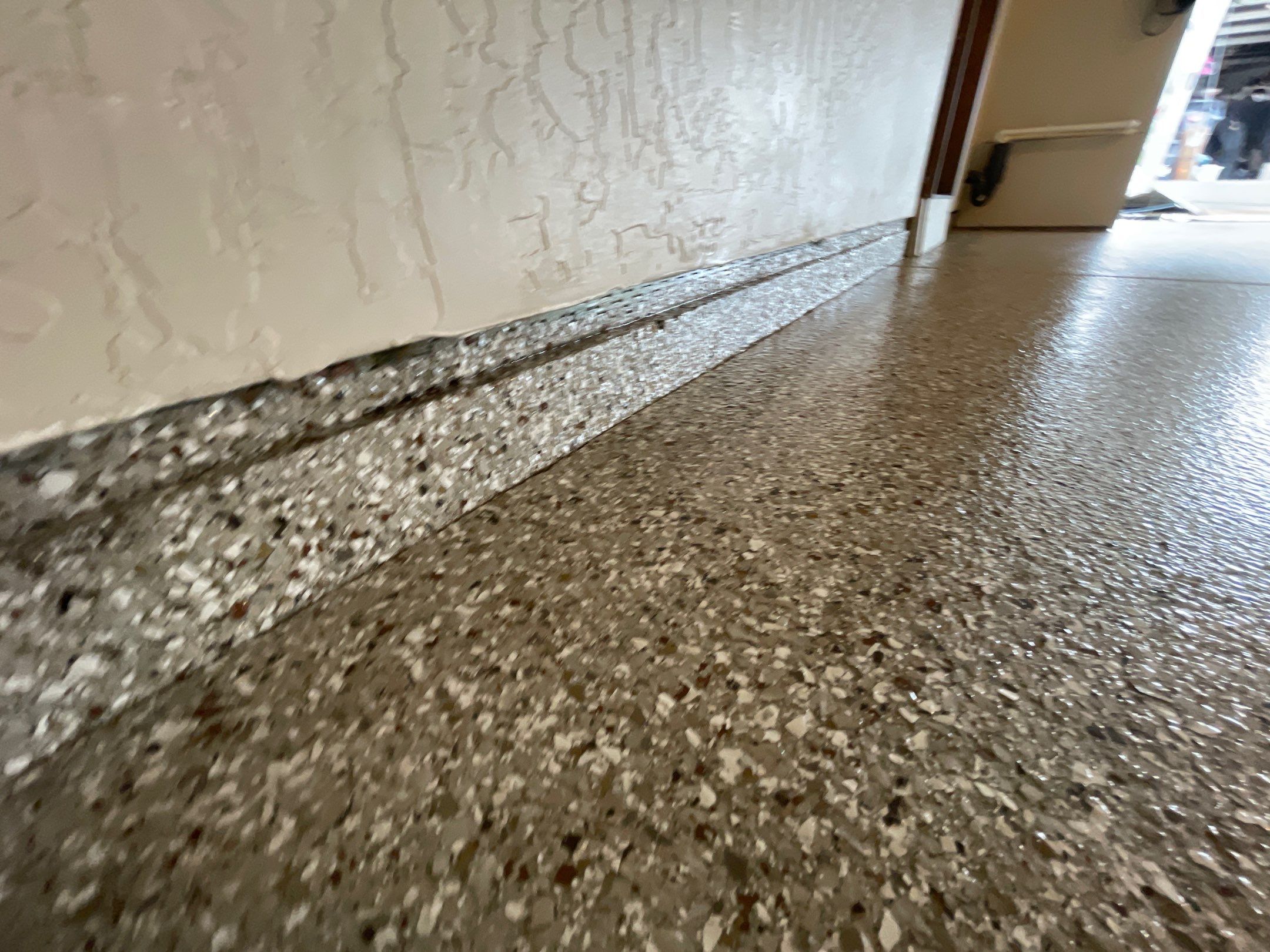 Garage Transformation using Pebble Beach and Front Porch using Greystone by Croc Coatings, LLC