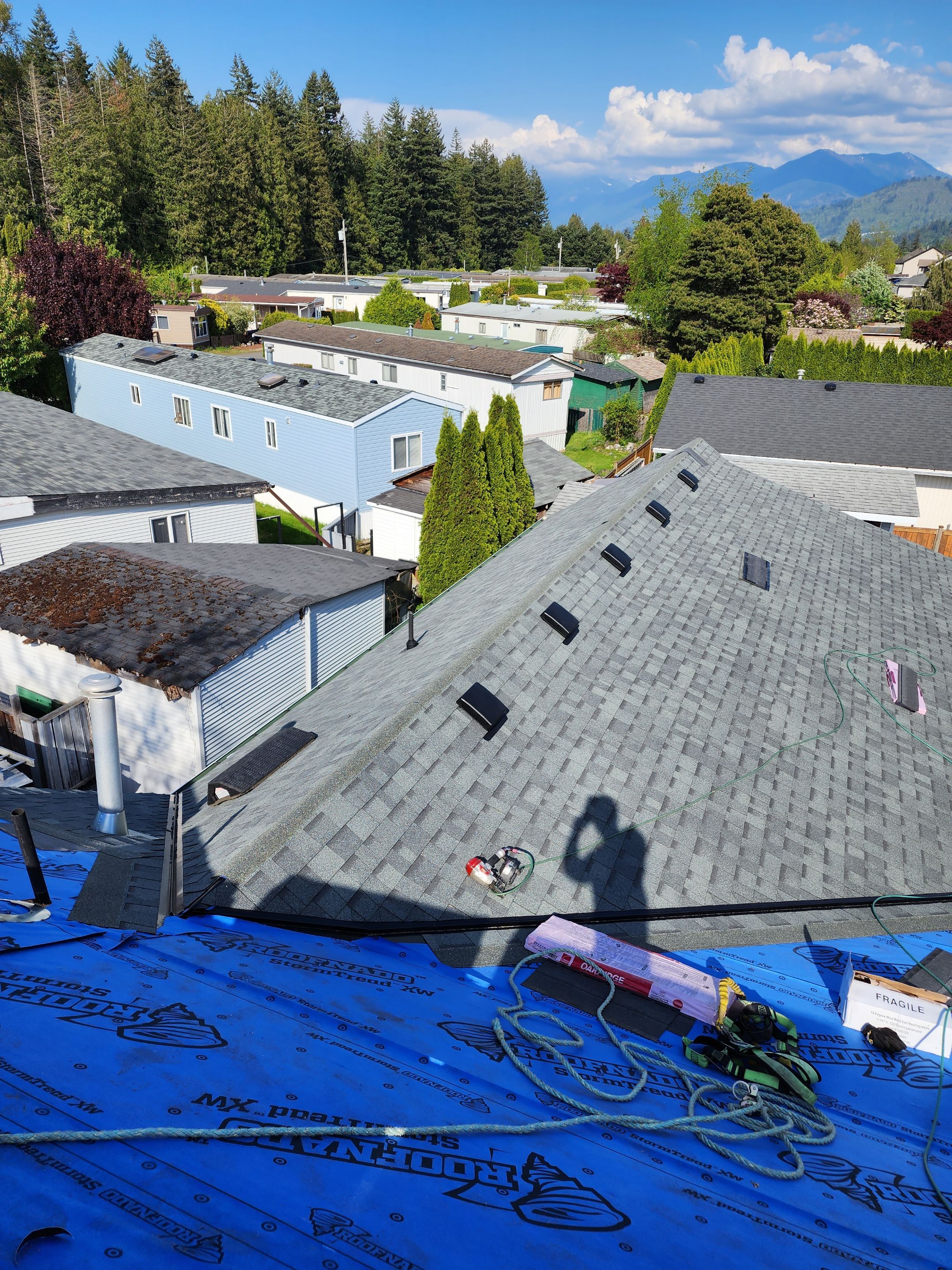 Residential Roofing Installation using Estate Gray Shingles by Top Notch Roofing Inc