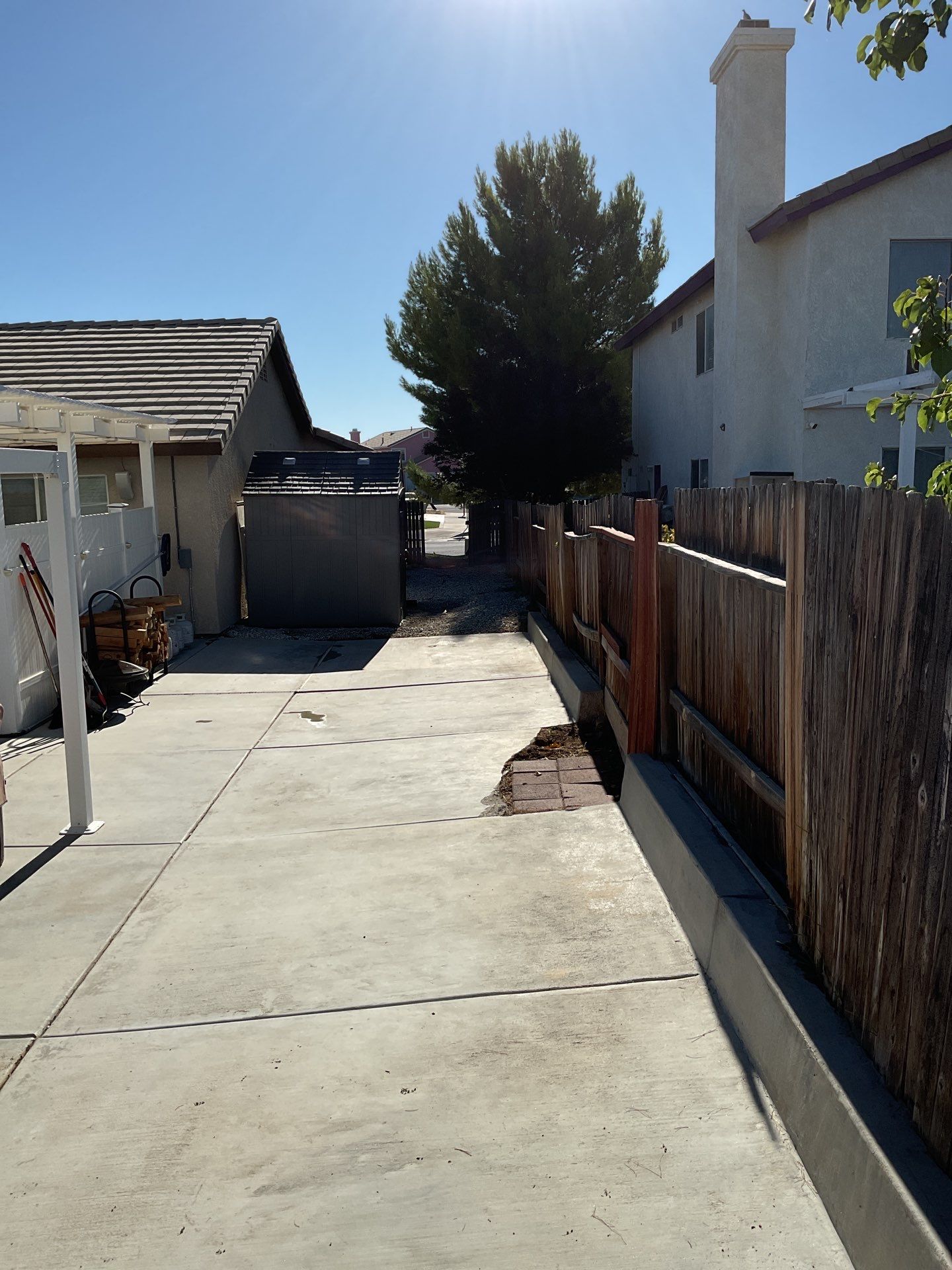 Lattice Vinyl with Privacy Vinyl Fence by Fence Guys Inc.