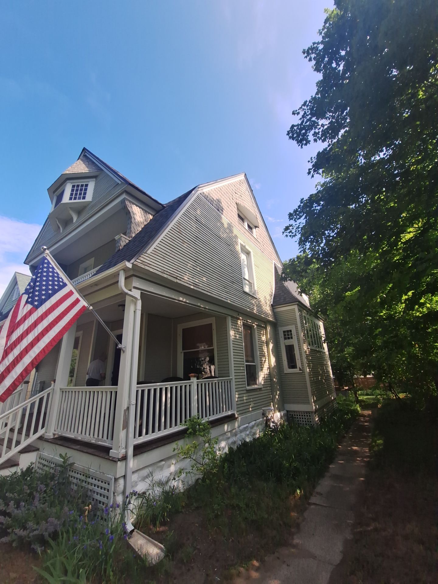 Exterior Home & Porch Refresh in Grand Haven, MI by Gordon Painting