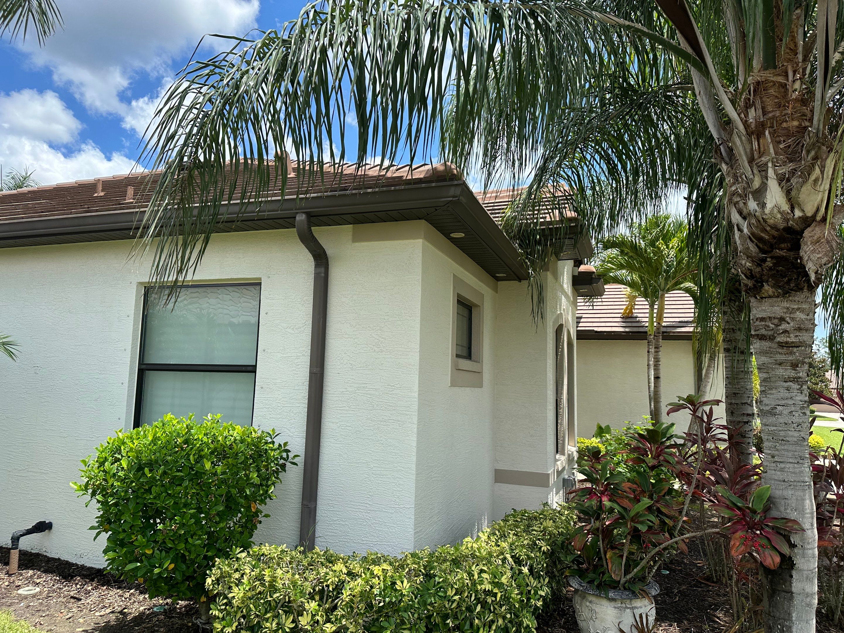 Flat Tile Roof Cleaning, House Wash & Sidewalk Cleaning in Enclave at Country Meadows, Bradenton, FL | Sunshine AquaWash by Sunshine AquaWash