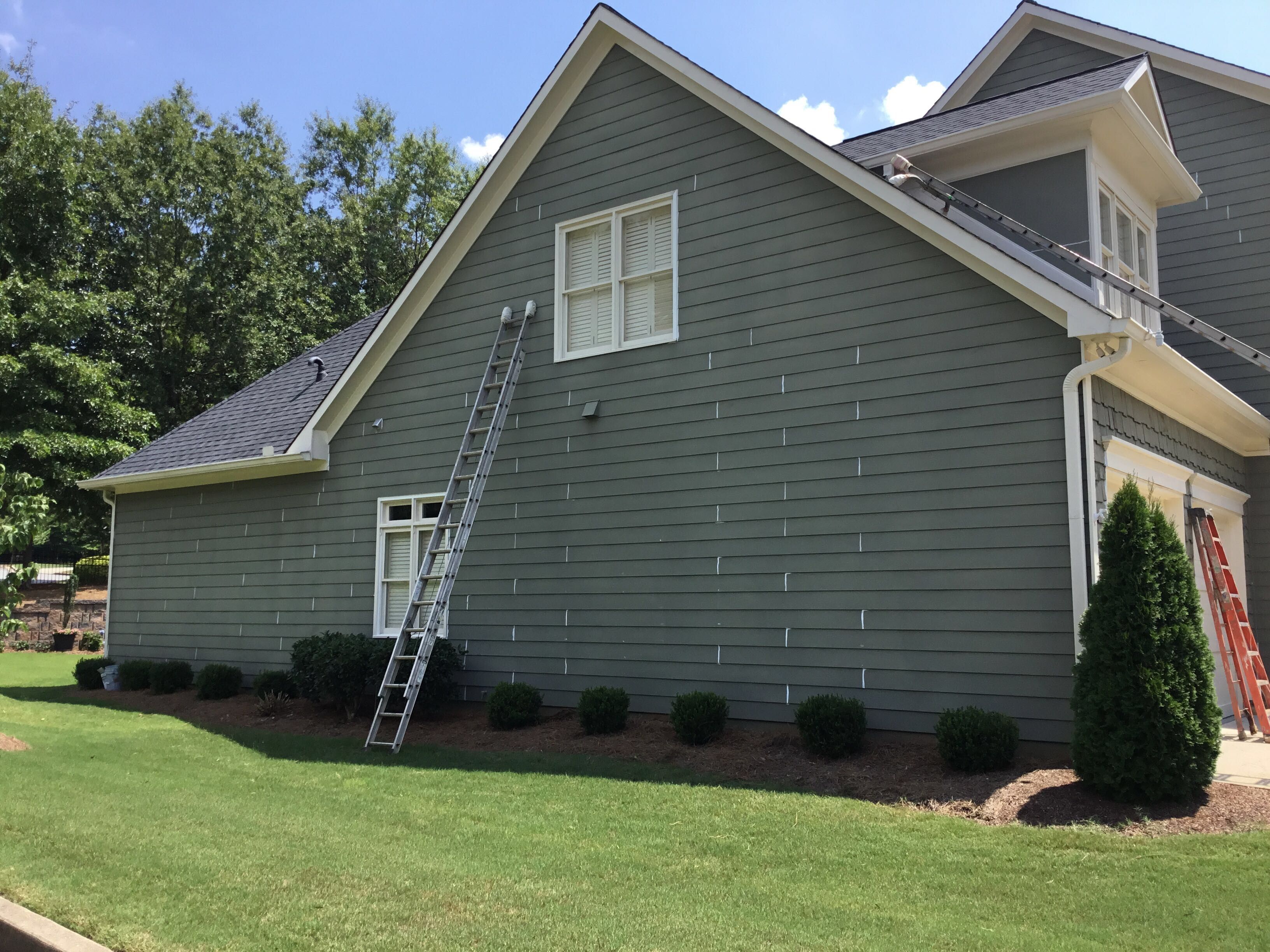 Sage Green Exterior House Painting and Trim Refresh in Acworth by Swift Home Renovations