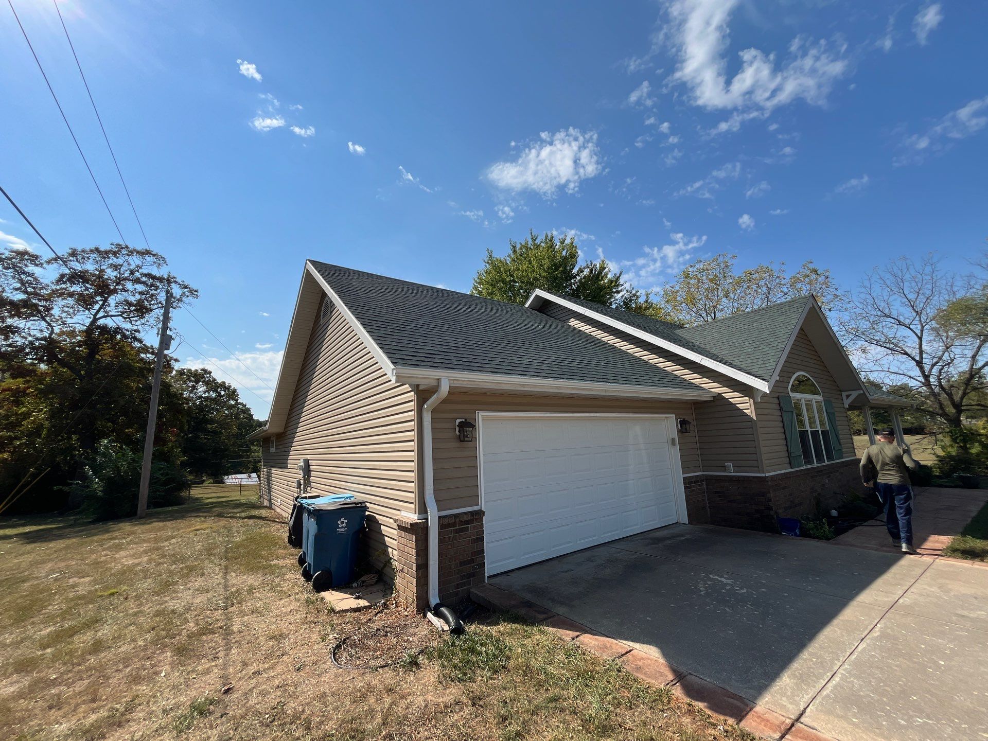 Residential Roofing Install - Green Atlas Pinnacle Pristine Shingles - White Gutters & Downspouts by Titan Commercial & Residential Roofing