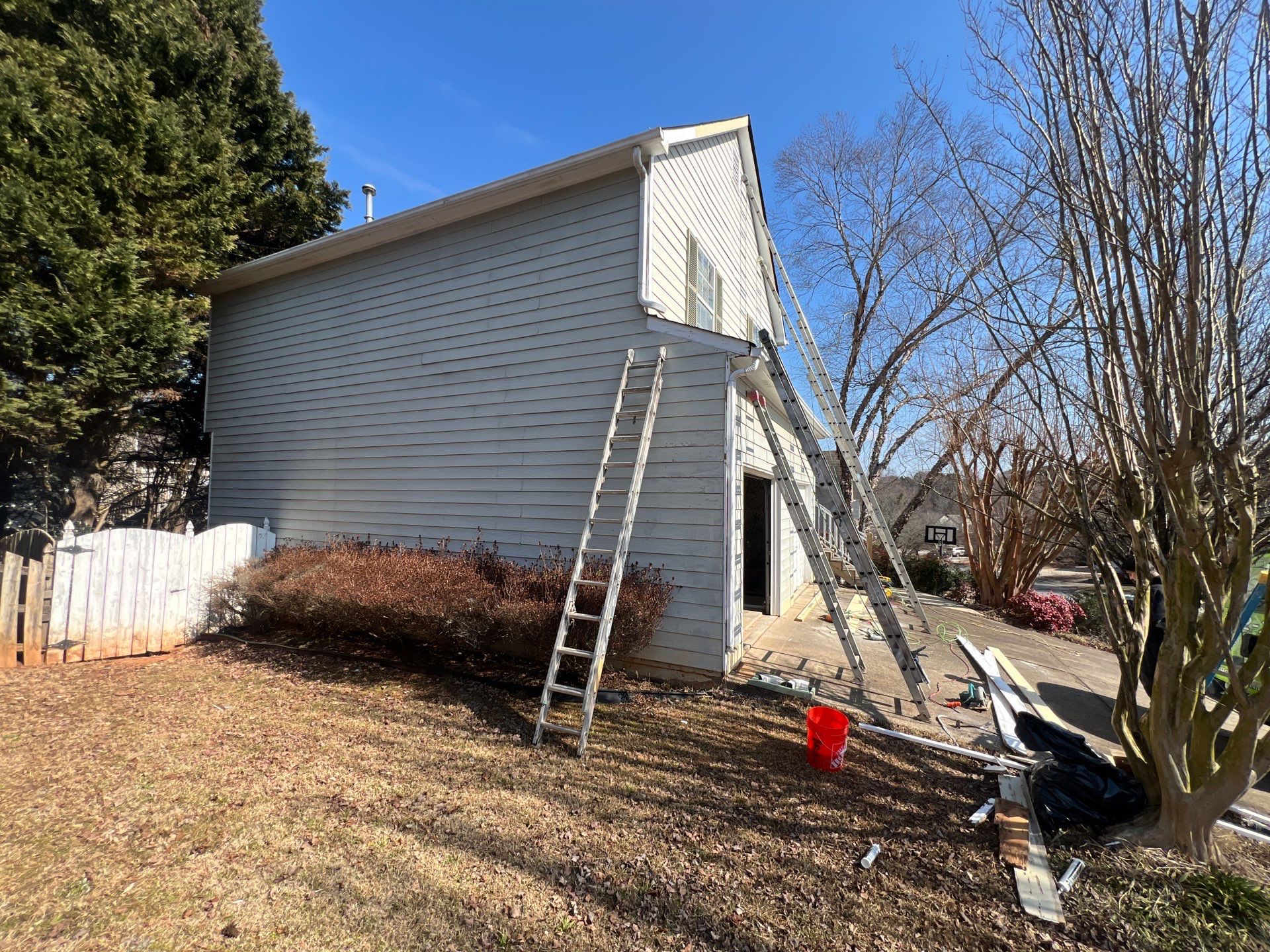 Exterior Residential Painting and Deck Staining in Kennesaw, Georgia by Swift Home Renovations