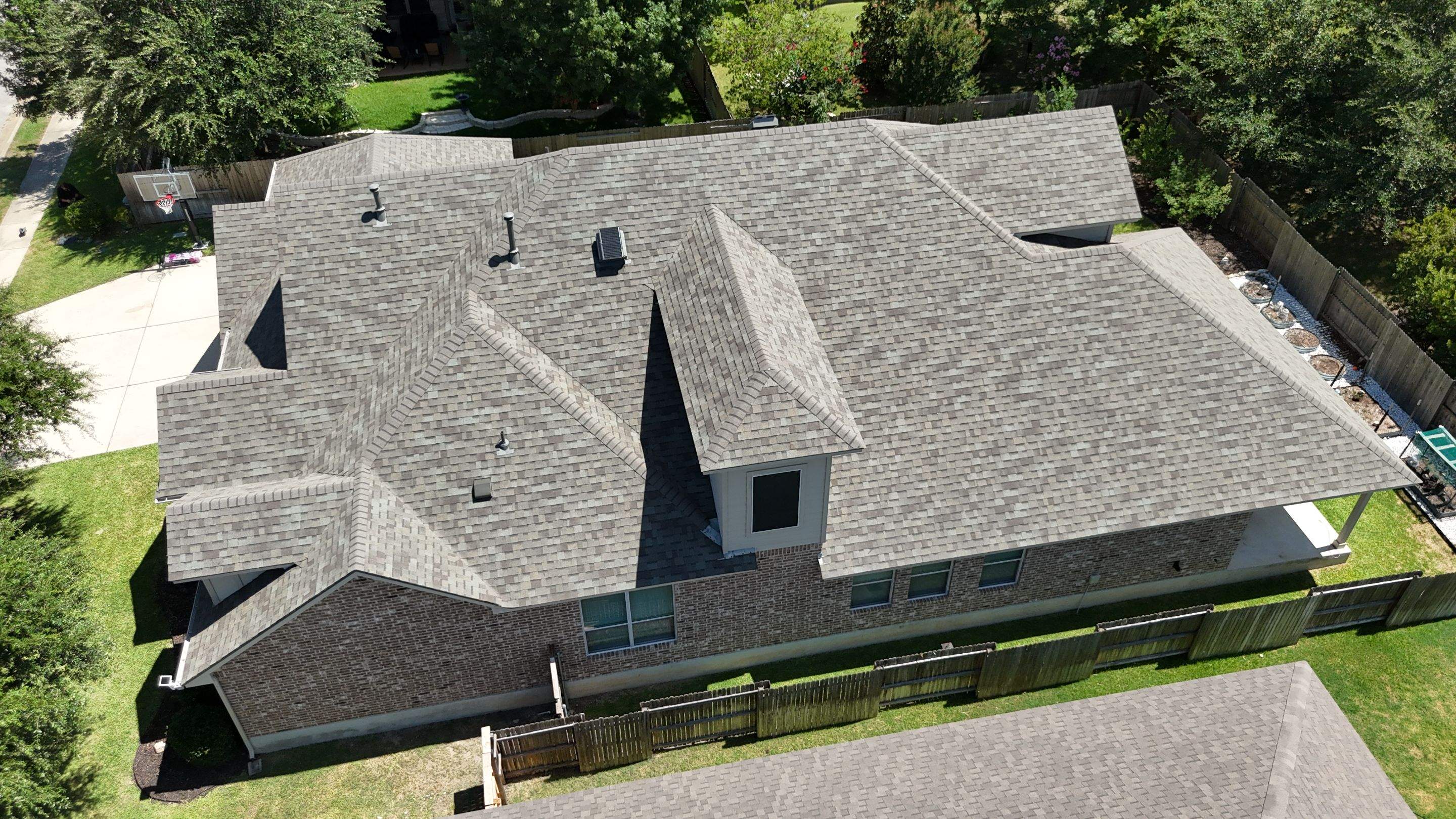 Residential Asphalt Shingle Roof Replacement and Solar Fan Installation by RoofsOnly.com