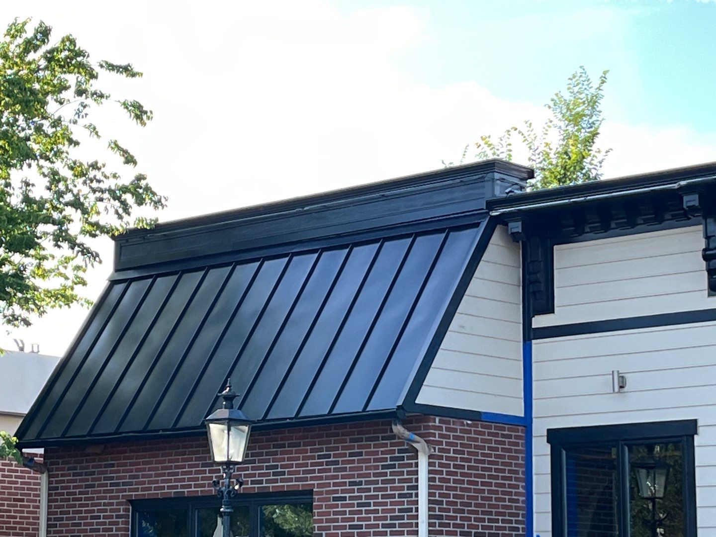 Roof painting, Jose Tequilas Norfolk, VA by AKK Painting LLC