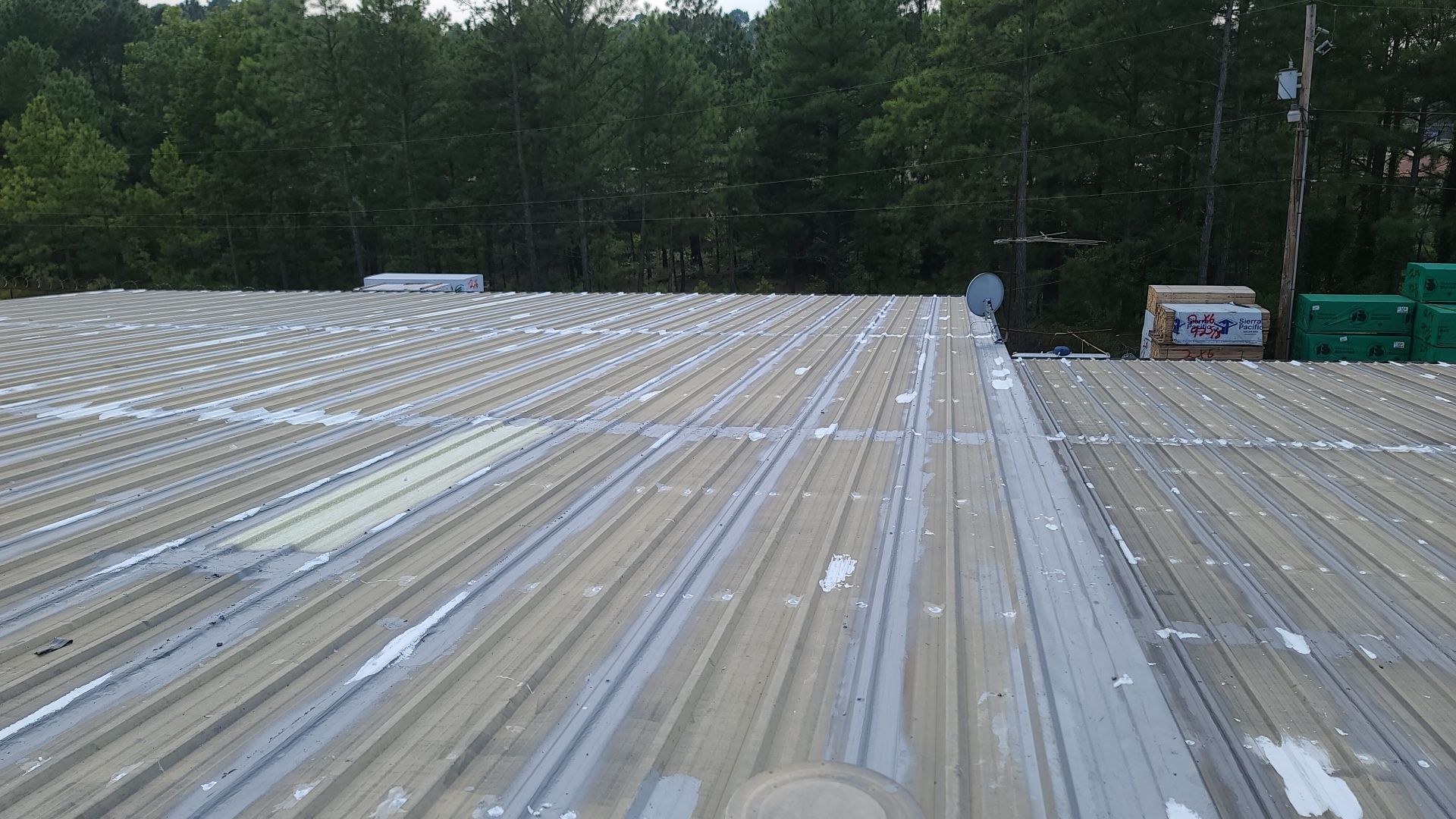 Commercial Roofing Installation using Aldocoat Coatings by Hostetler Roofing